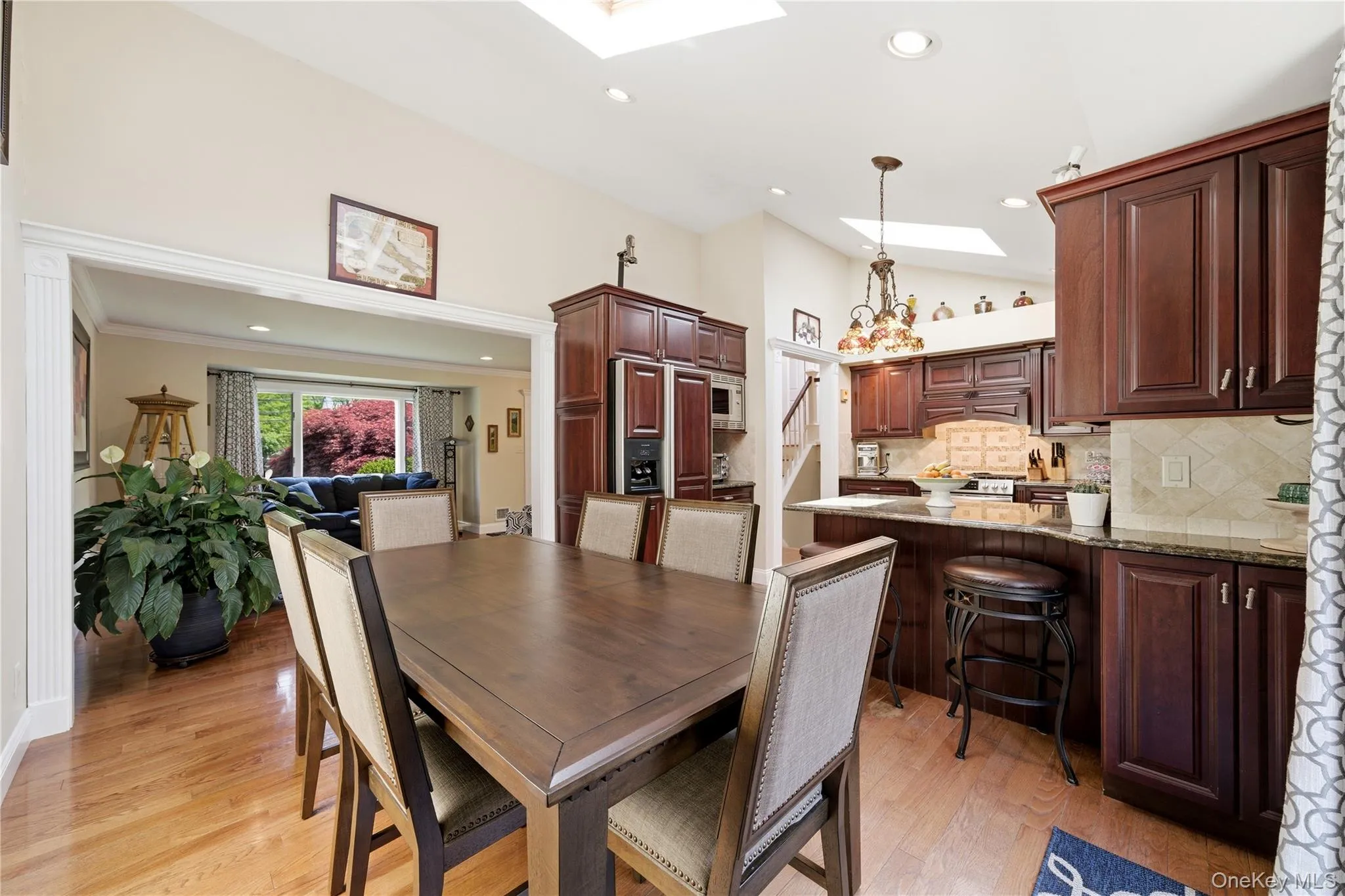 Dining Area w/ Skylight & Sliding Glass Doors to Deck Dining Area w/ Skylight & Sliding Glass Doors to Deck