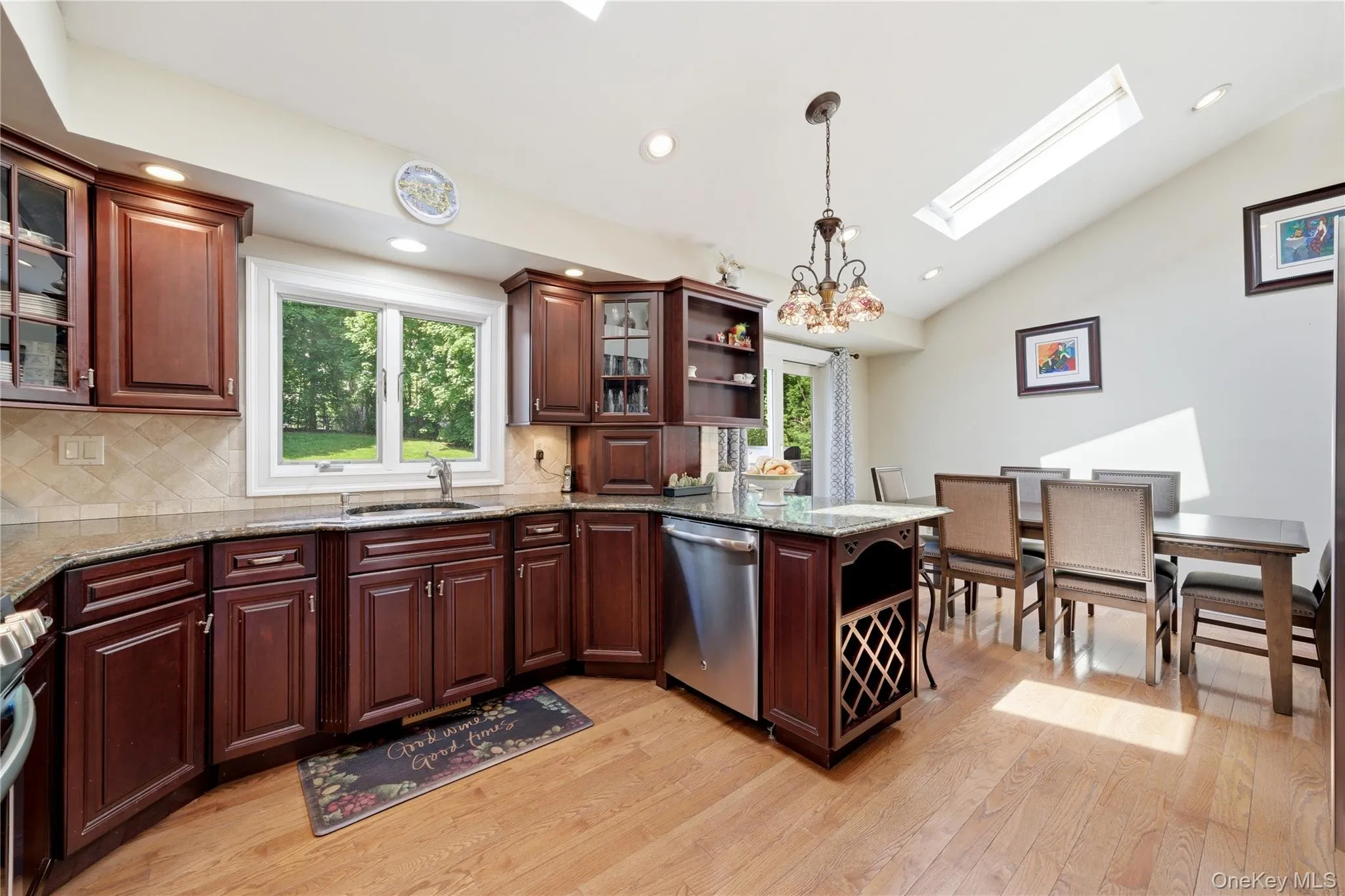 Granite Counters, Glass Inlays in Cabinets, Wine Holder, Tiled Backsplash Granite Counters, Glass Inlays in Cabinets, Wine Holder, Tiled Backsplash