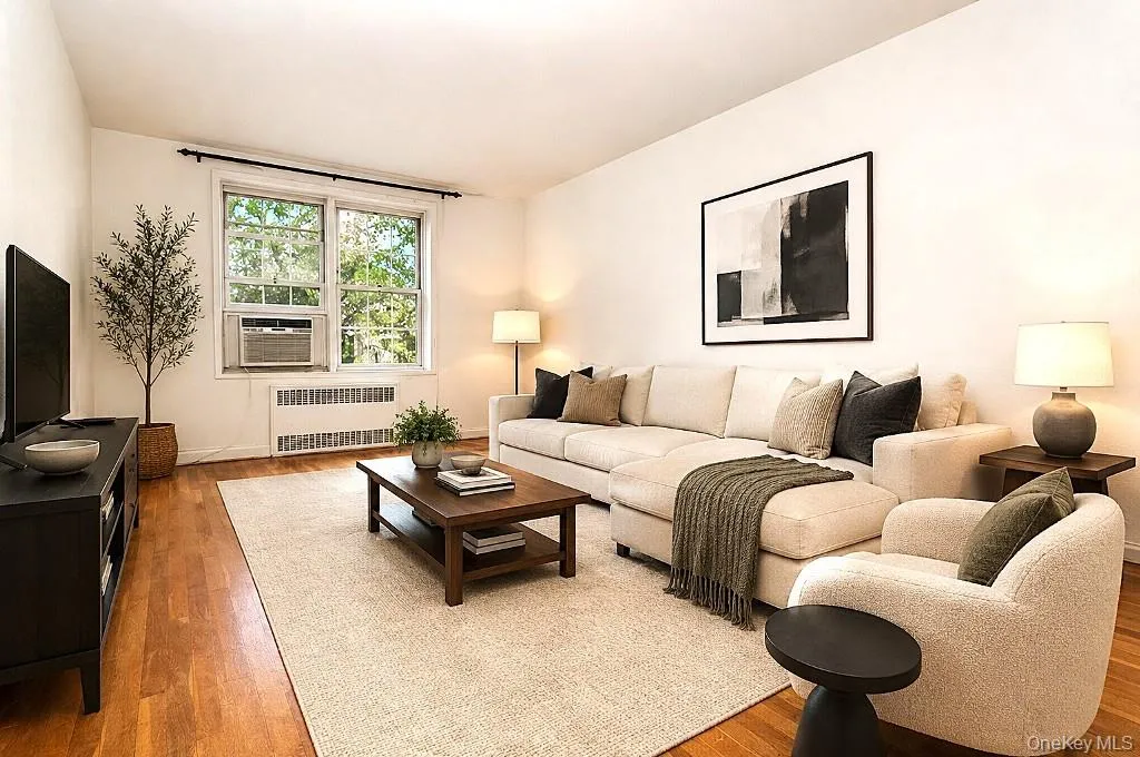 Photo Visually Staged....Large living room opens to the dining foyer and is approx 19'-1" x 11'-11" plus the Dining area which is an additional 10'-0" x 14'-1" Photo Visually Staged....Large living room opens to the dining foyer and is approx 19'-1" x 11'-11" plus the Dining area which is an additional 10'-0" x 14'-1"