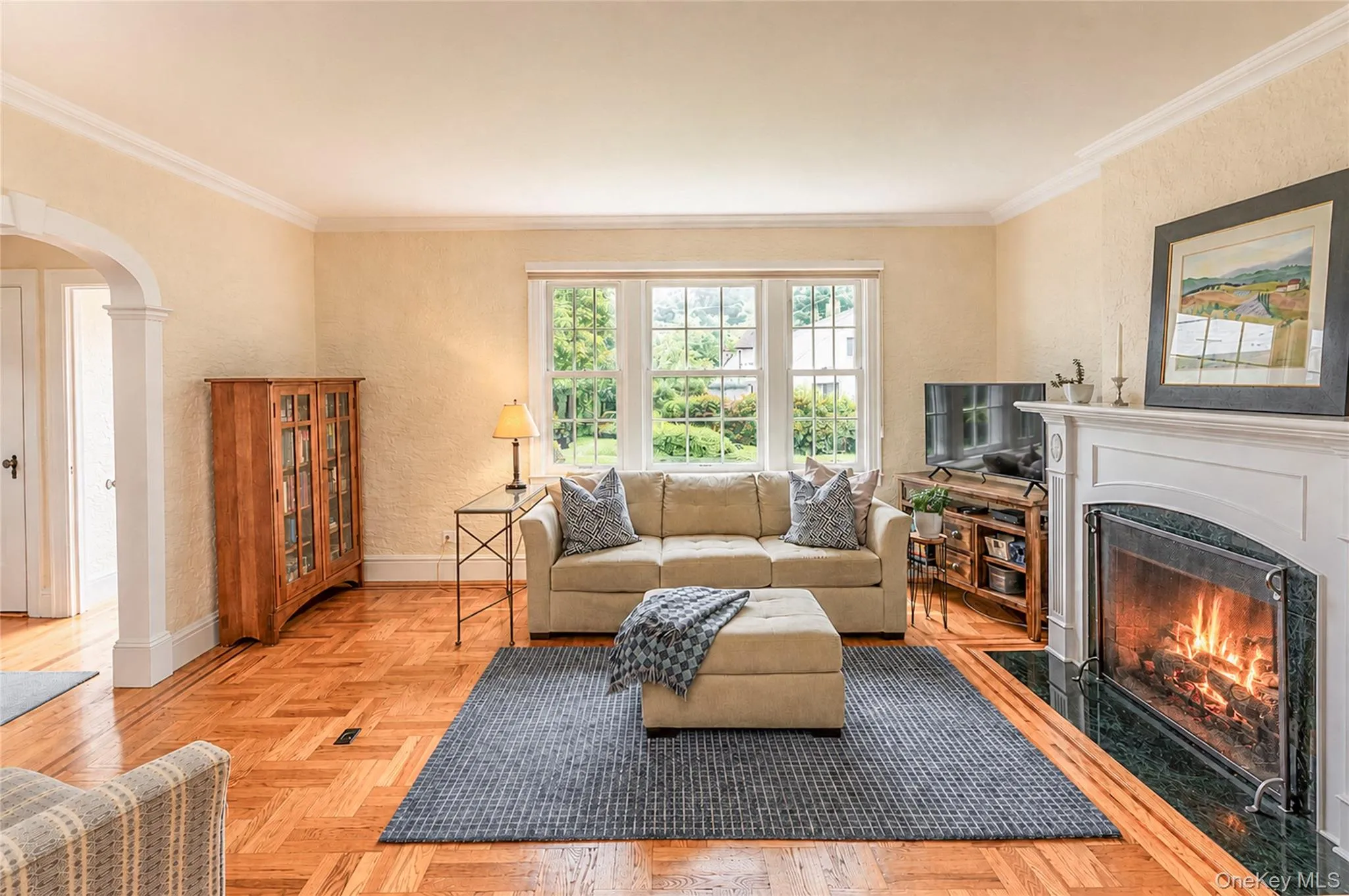 Another view of the Formal Living Room with lots of of light and Hardwood floors. Another view of the Formal Living Room with lots of of light and Hardwood floors.