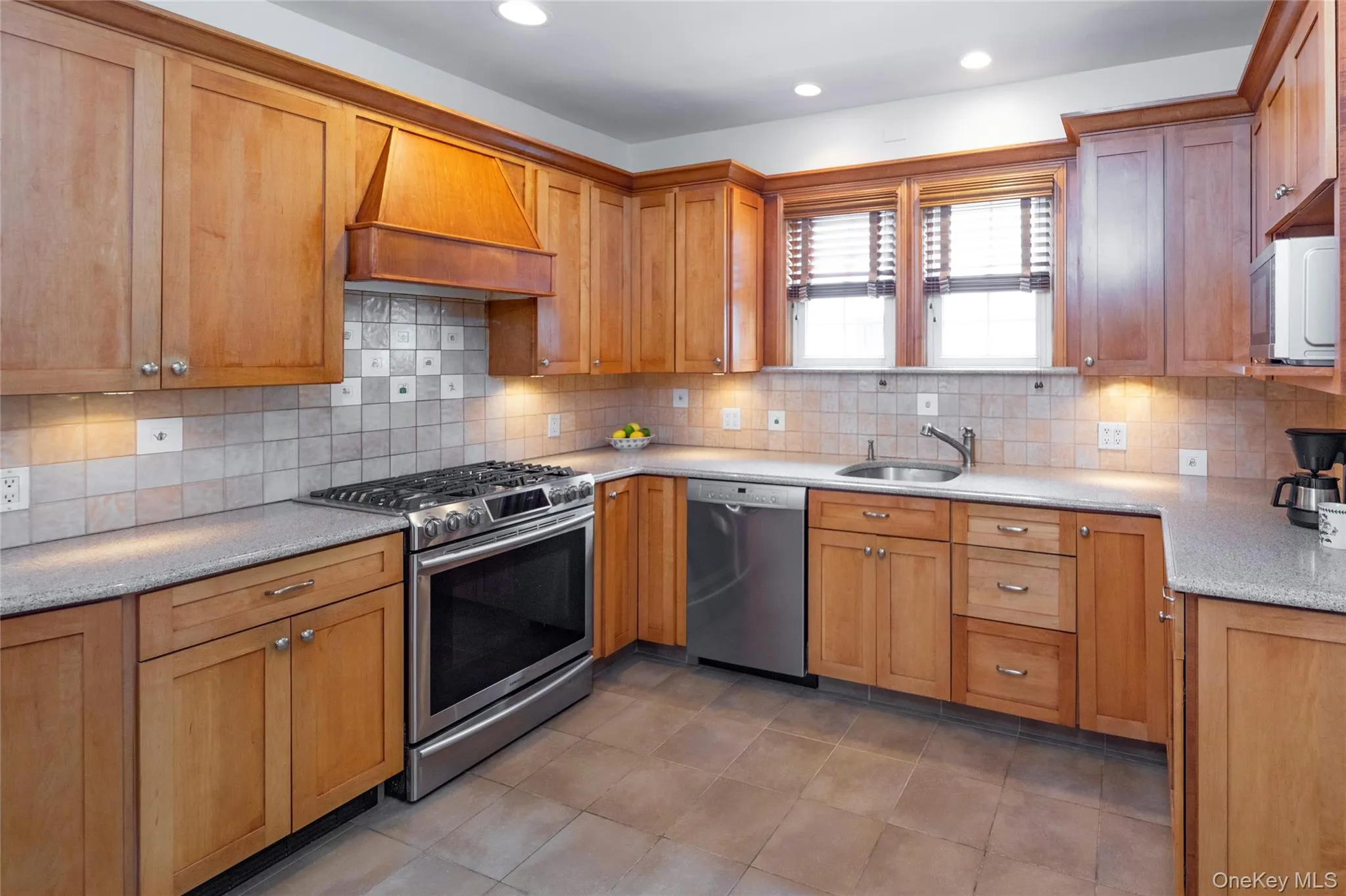 Renovated kitchen offering lots of cabinets and counter space. Renovated kitchen offering lots of cabinets and counter space.