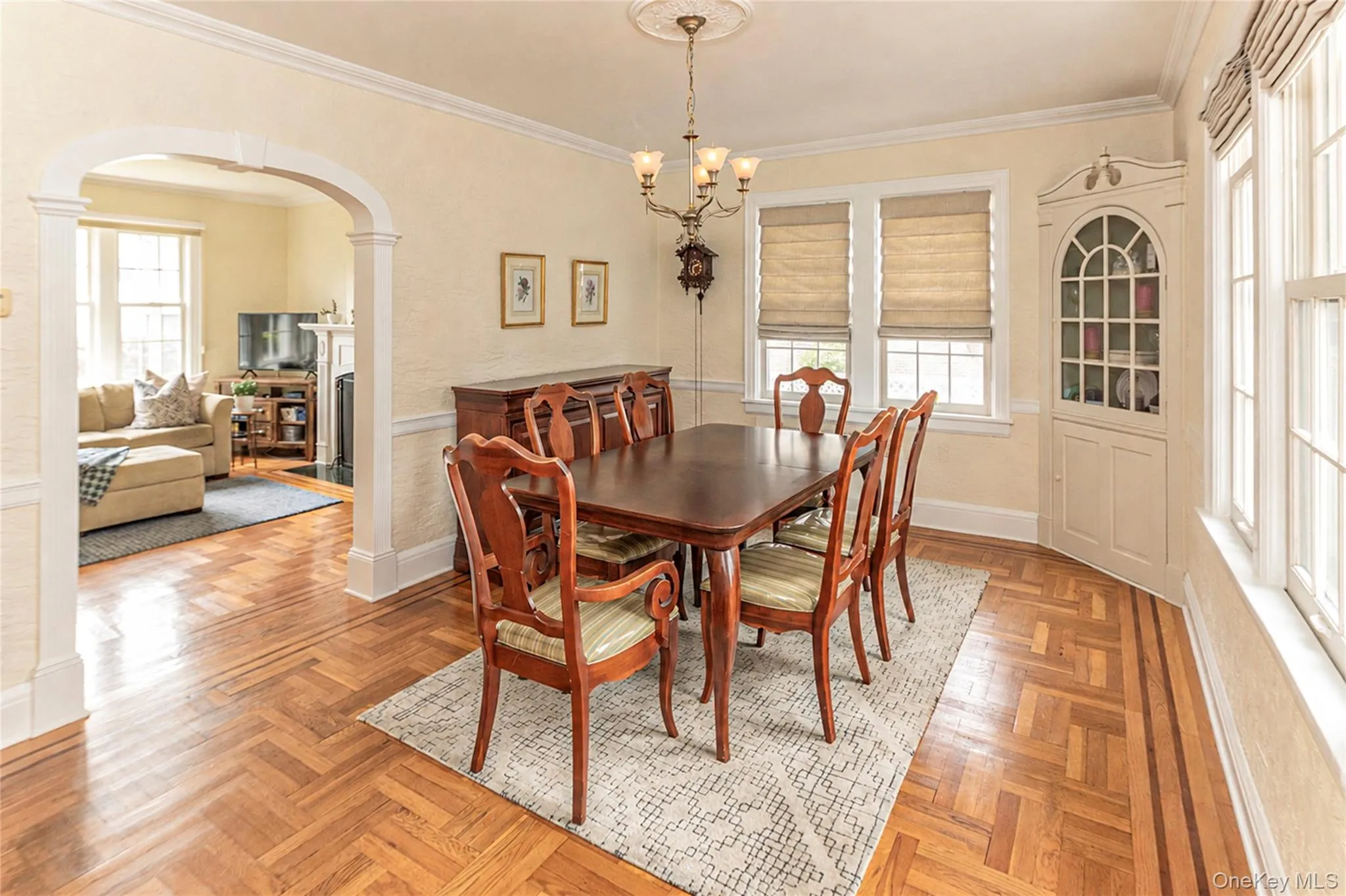 Formal Dining Room with Lots of light and corner built-in. Great for entertaining! Formal Dining Room with Lots of light and corner built-in. Great for entertaining!