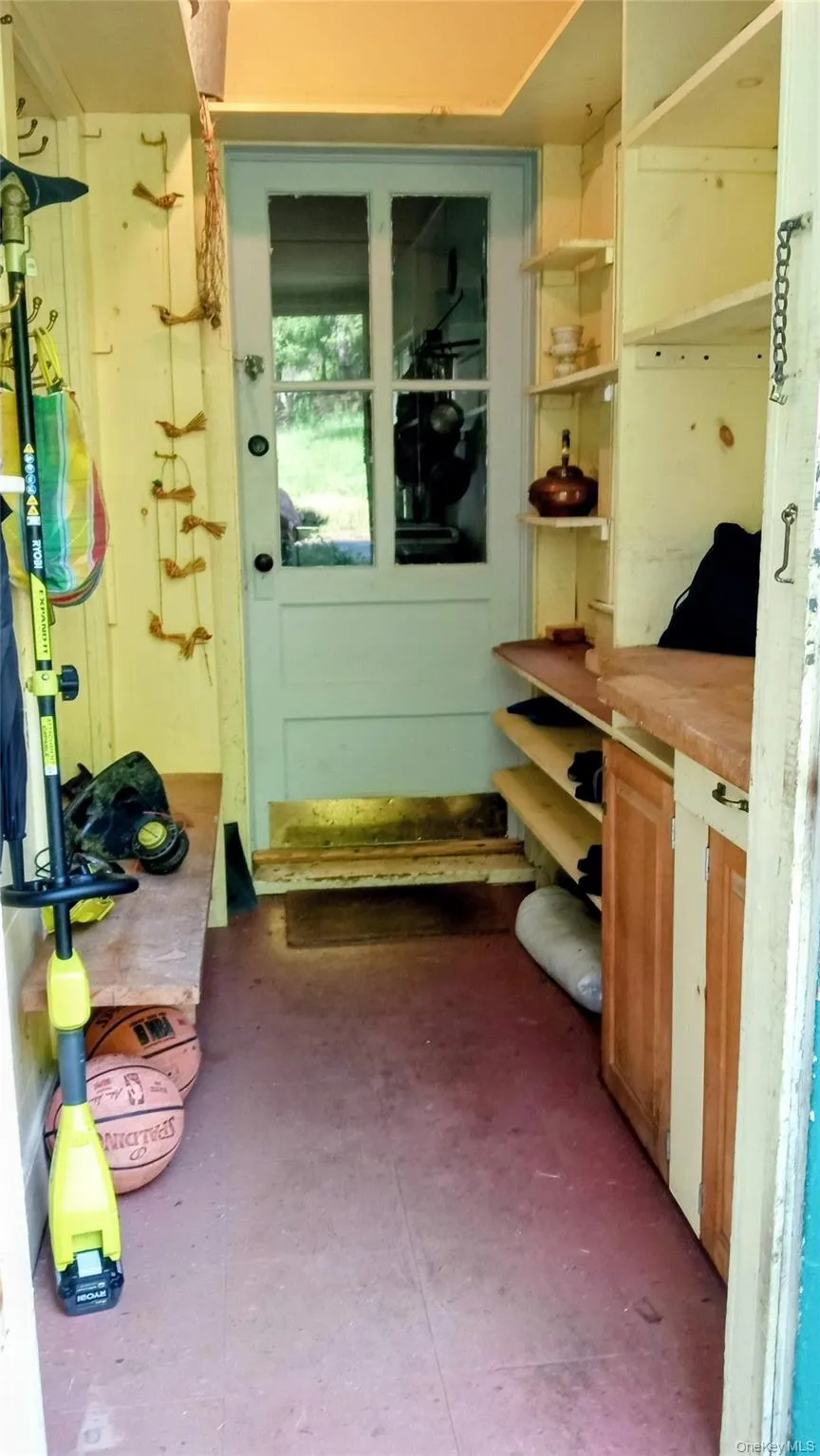 Mudroom and entrance to kitchen from outside Mudroom and entrance to kitchen from outside