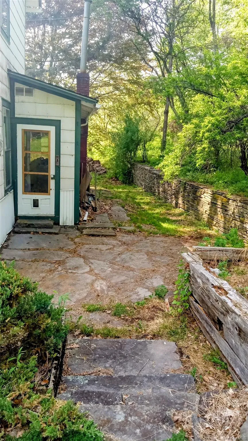 back of home with mudroom entrance back of home with mudroom entrance