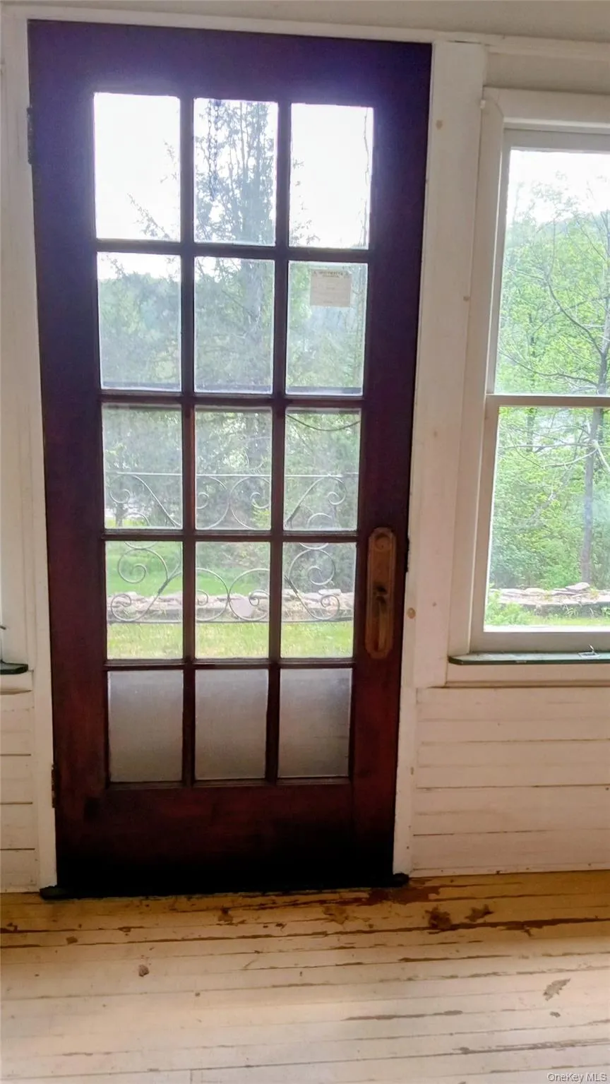 Front door to porch from dining room Front door to porch from dining room