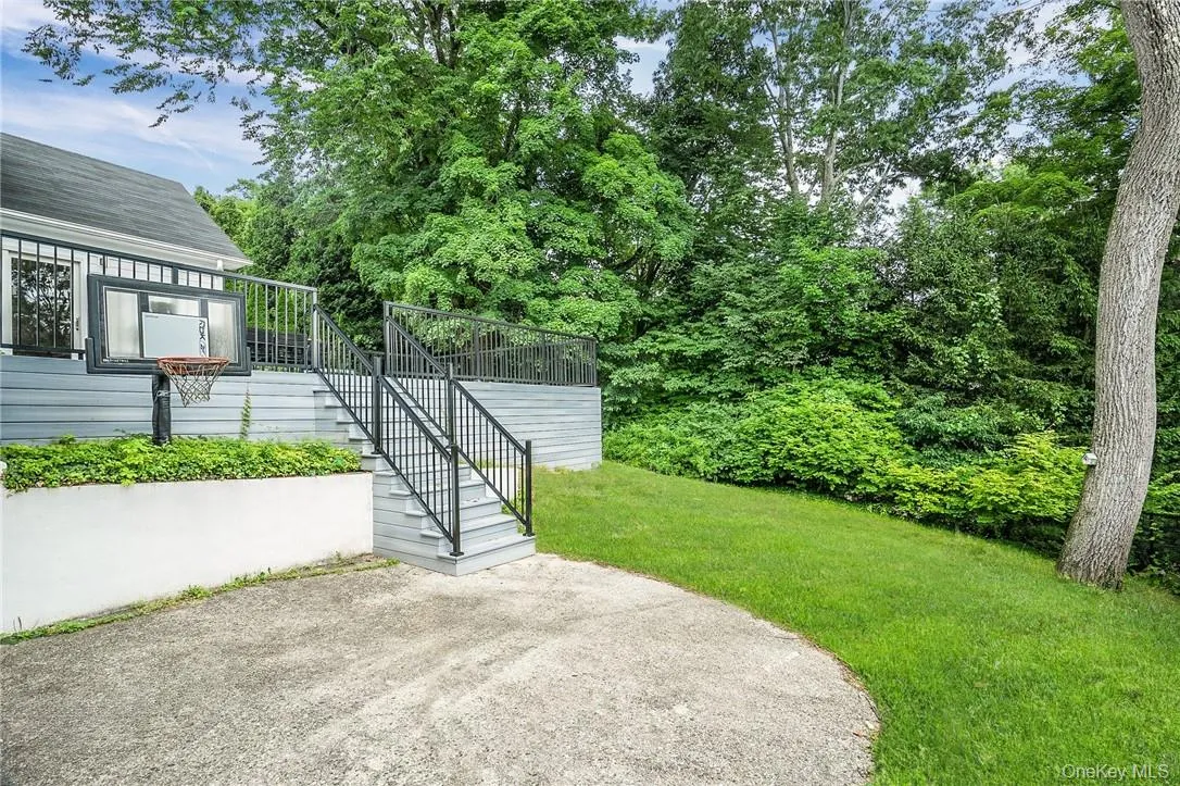 Backyard has both grassy area and large deck! Backyard has both grassy area and large deck!