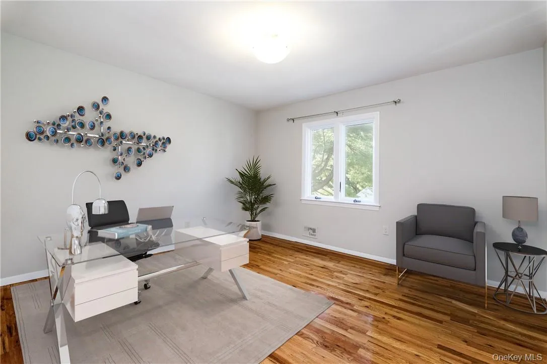 First floor office or family bedroom (digitally staged). First floor office or family bedroom (digitally staged).