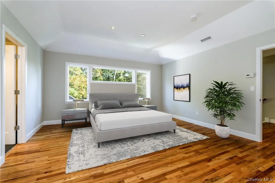Primary bedroom oasis on the second level with large walk-in closet and luxurious ensuite master bath. (Digitally staged) Primary bedroom oasis on the second level with large walk-in closet and luxurious ensuite master bath. (Digitally staged)