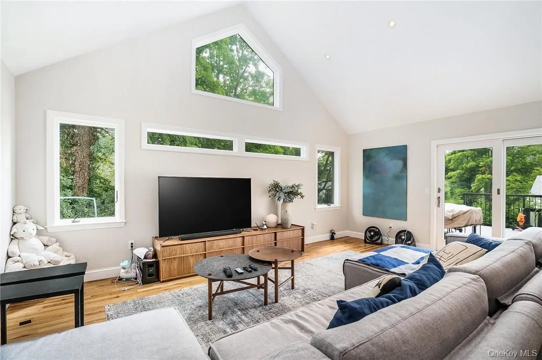 Enjoy the inviting family room off the kitchen with glass sliders to new deck. Enjoy the inviting family room off the kitchen with glass sliders to new deck.
