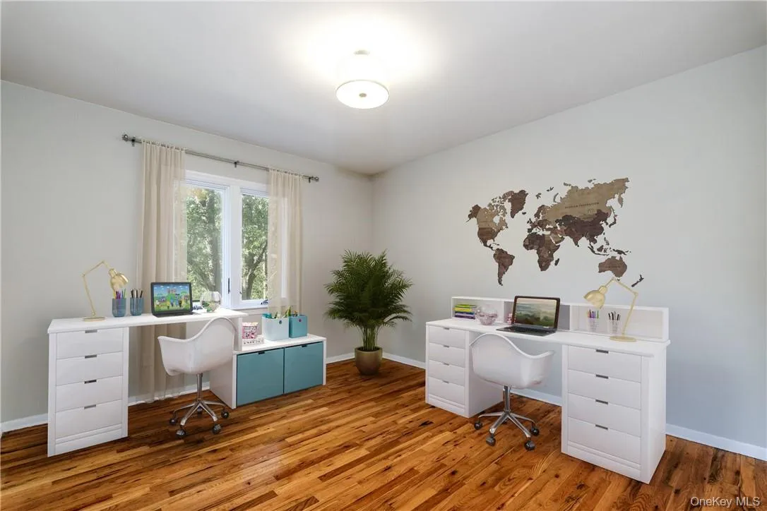 First level office or homework room. (Digitally staged.) First level office or homework room. (Digitally staged.)