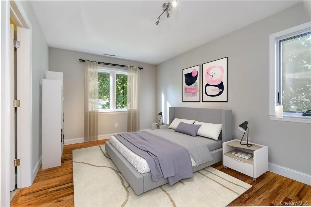 Second level family bedroom with ensuite bath and two exposures. Second level family bedroom with ensuite bath and two exposures.