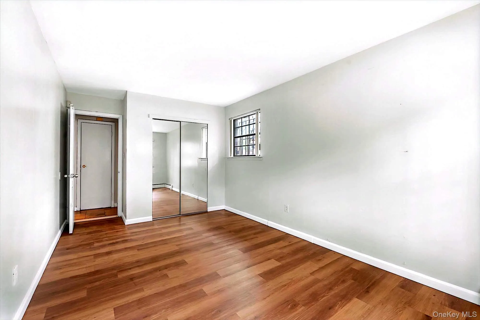 Bedroom with a closet and extra window on the first floor Bedroom with a closet and extra window on the first floor