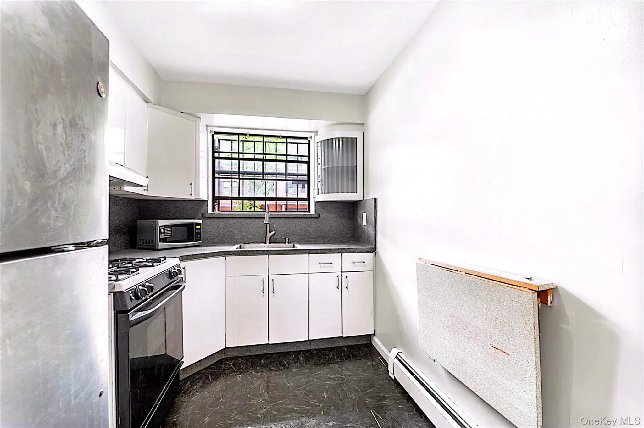 Eat in kitchen with large window Eat in kitchen with large window