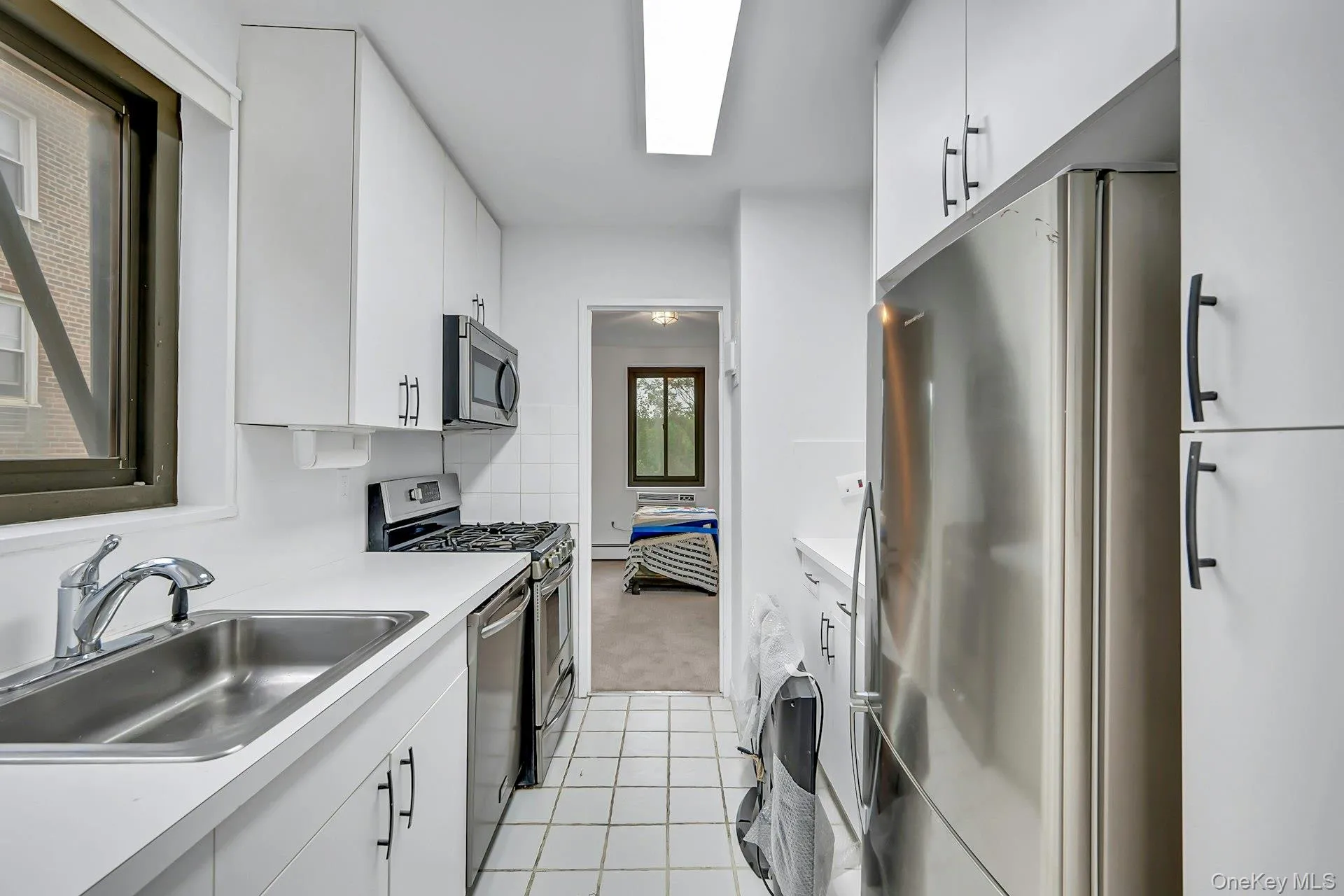 Kitchen with newer stainless appliances, fresh paint Kitchen with newer stainless appliances, fresh paint