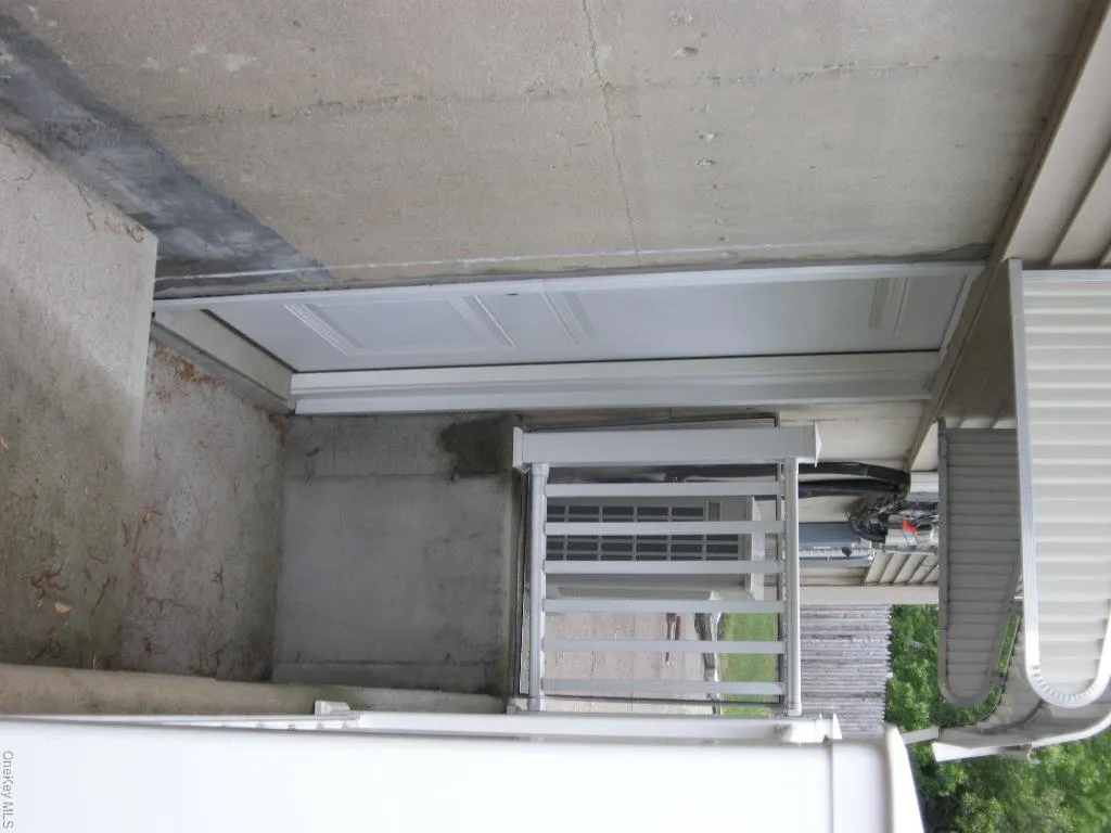 Garage door side entrance. Garage door side entrance.