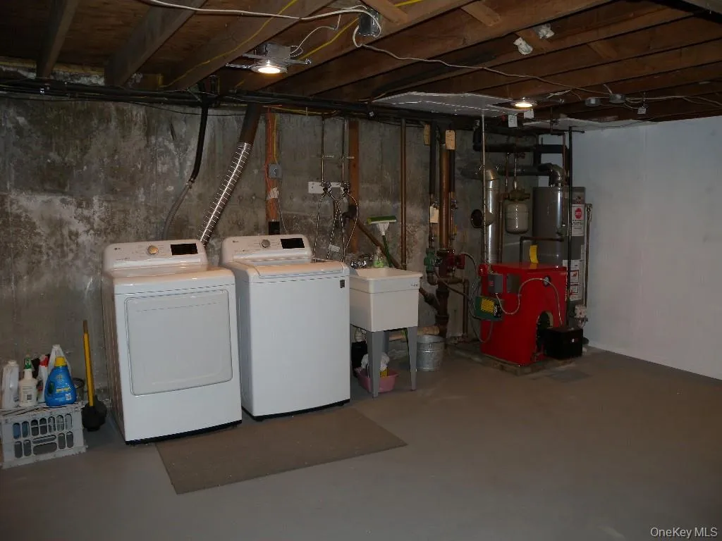 Washer/dryer setup 40 Gallon hot water tank. Washer/dryer setup 40 Gallon hot water tank.
