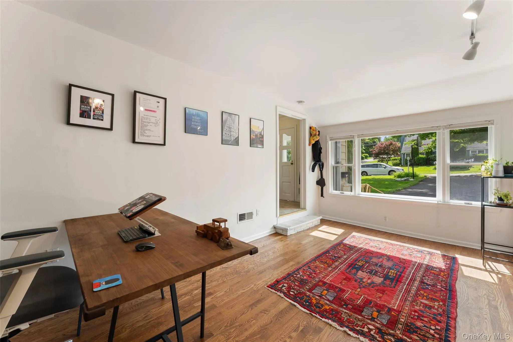 First floor home office with fireplace and picture window, perfect for an office, sitting room, or reading room. First floor home office with fireplace and picture window, perfect for an office, sitting room, or reading room.