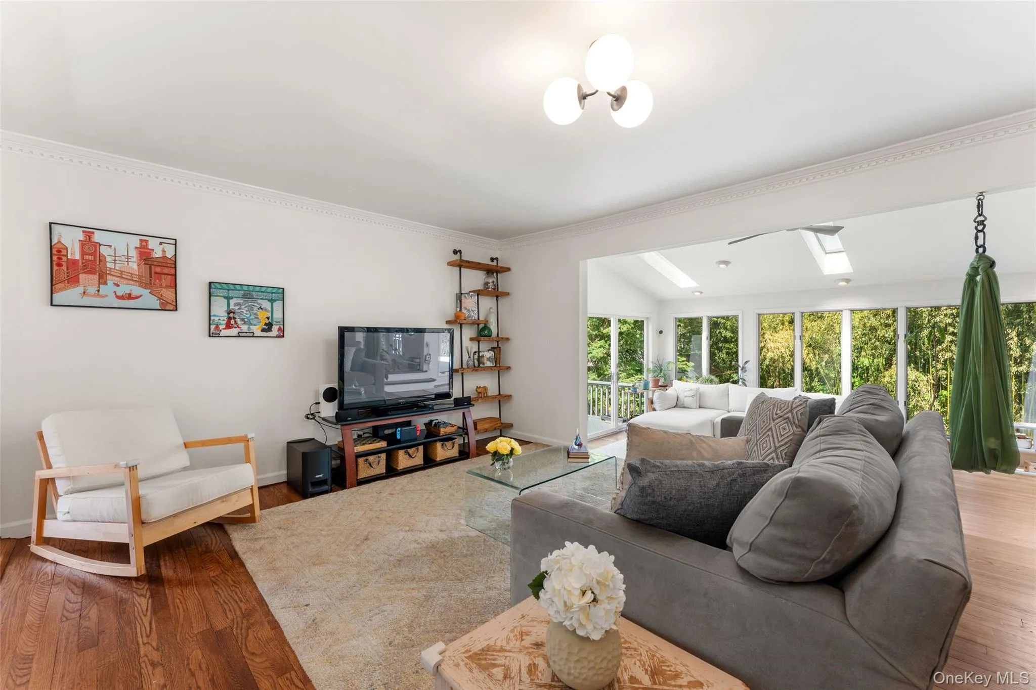 Sun filled family room with easy flow to the surrounding living spaces. Sun filled family room with easy flow to the surrounding living spaces.