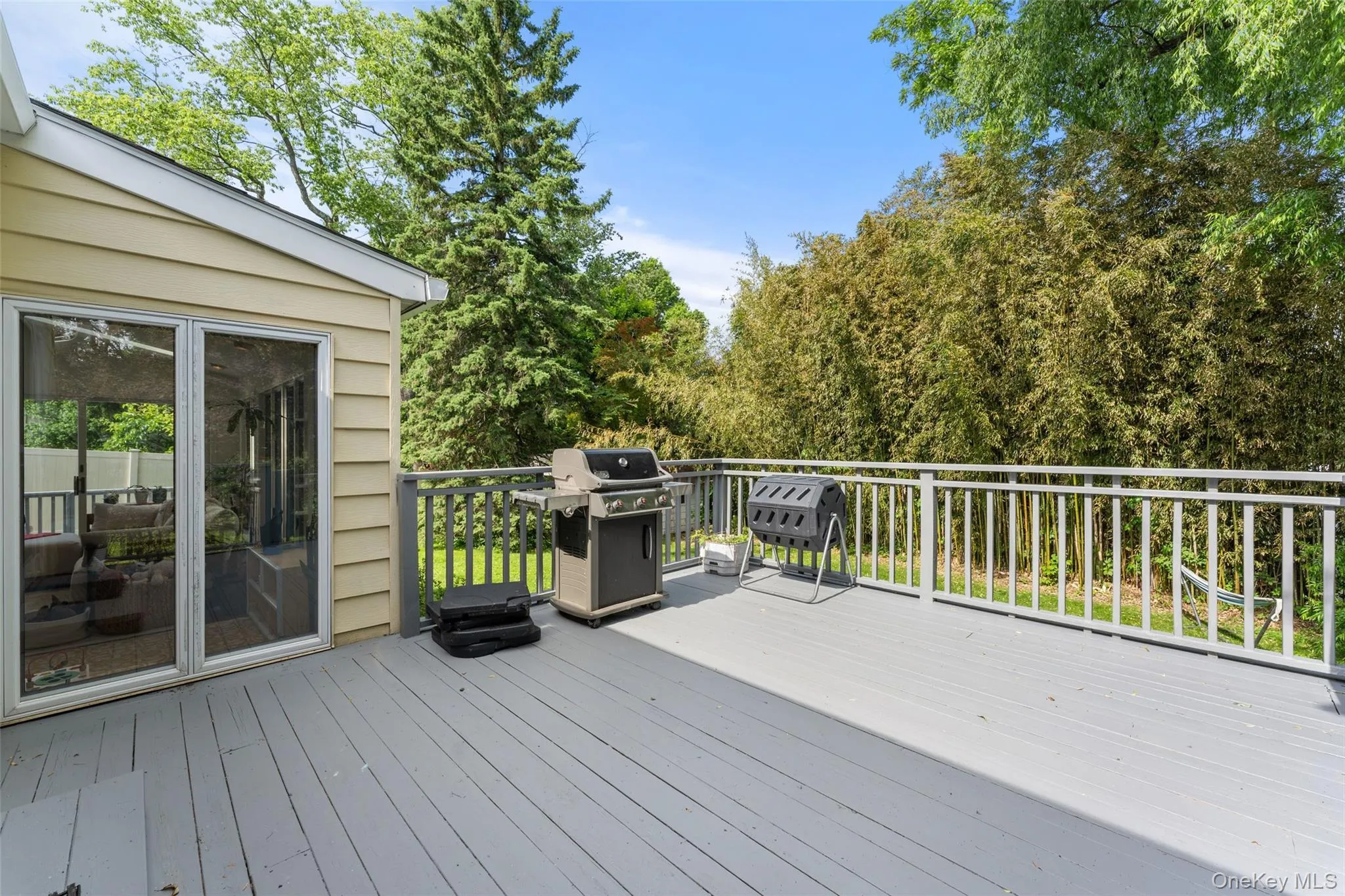 Spacious deck off the kitchen, perfect for entertaining and everyday gatherings. Spacious deck off the kitchen, perfect for entertaining and everyday gatherings.