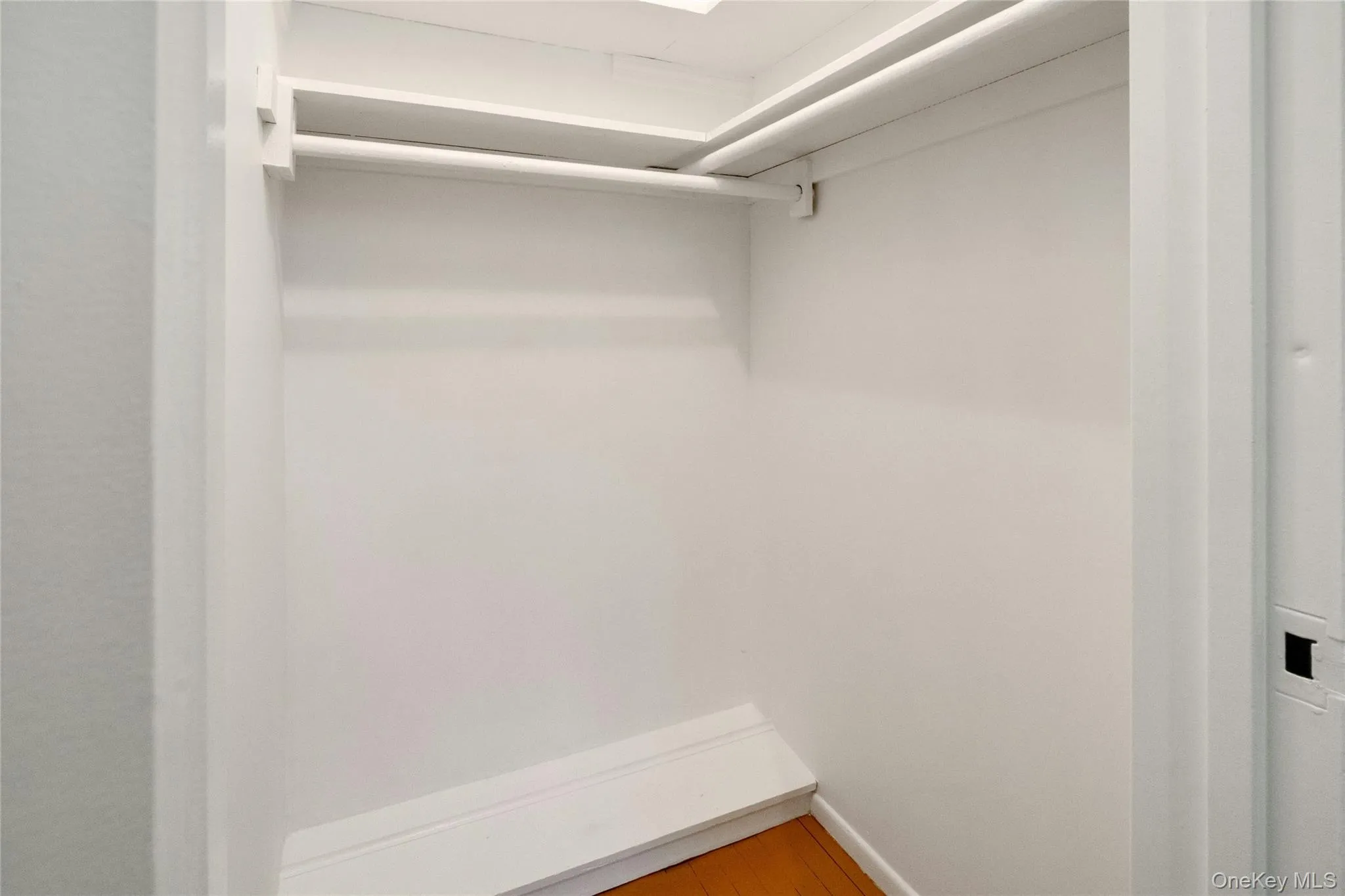 Primary Bedroom Walk-In Closet Primary Bedroom Walk-In Closet