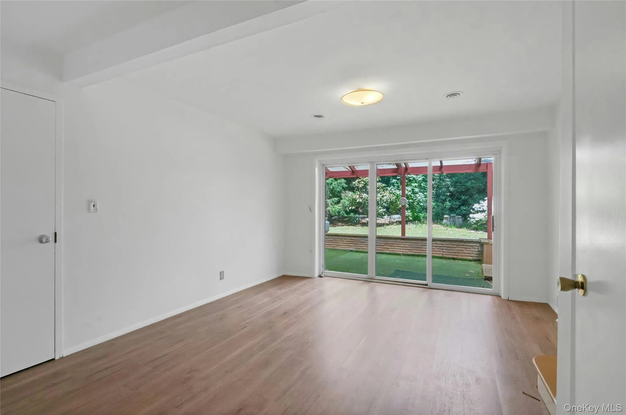 Family Room with Sliders to Back yard Family Room with Sliders to Back yard