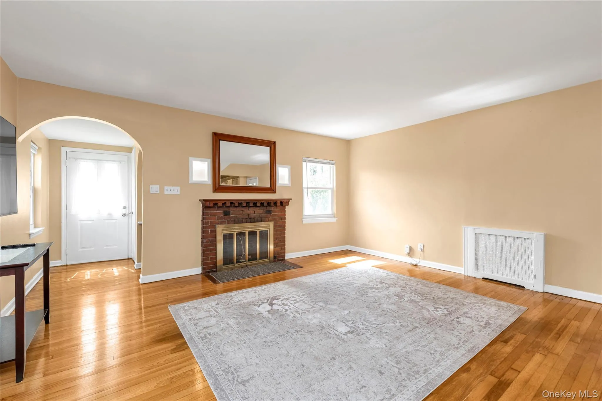 Living area featuring wood floors Living area featuring wood floors