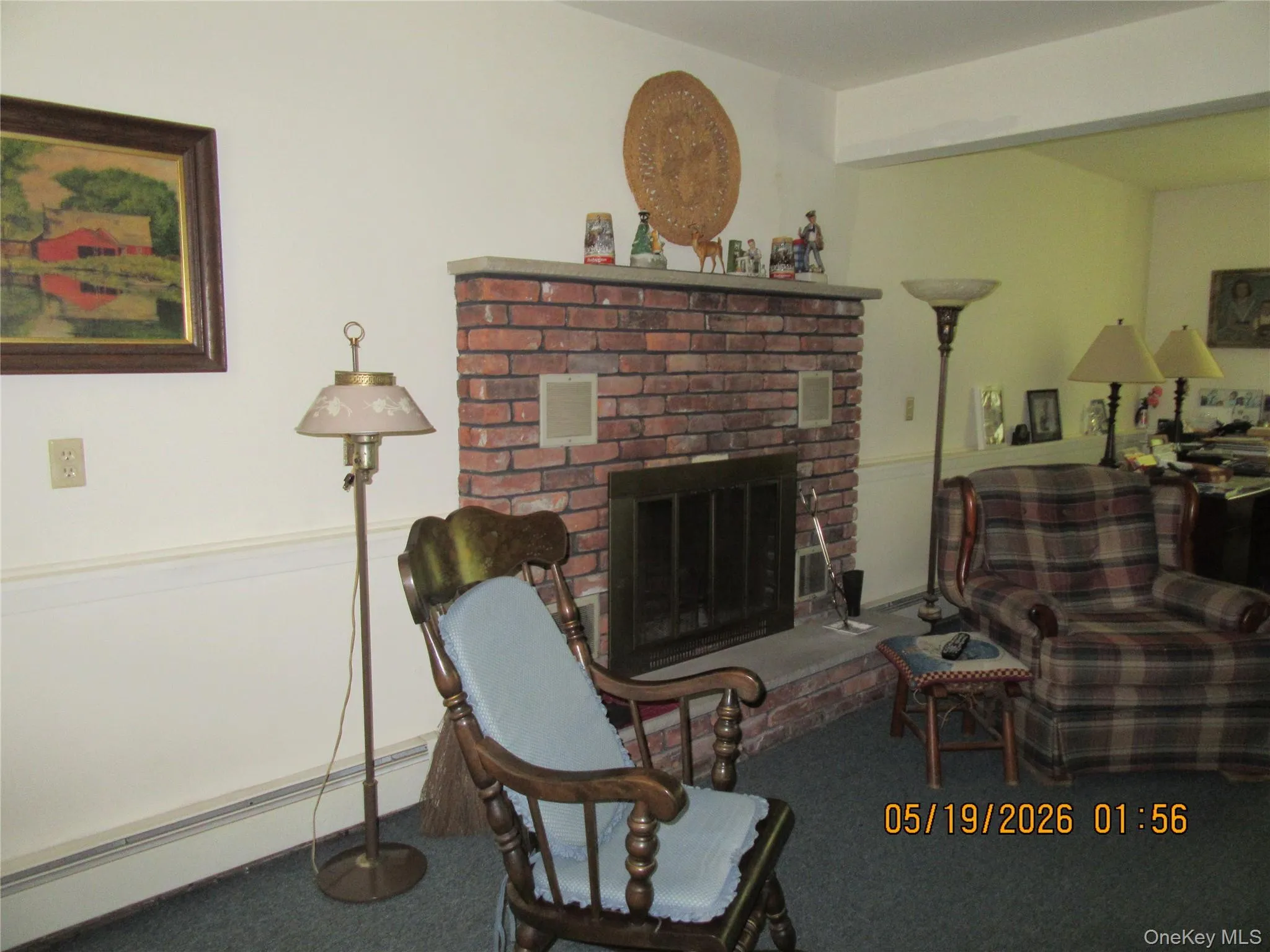Brick fireplace with a stone mantel and hearth Brick fireplace with a stone mantel and hearth