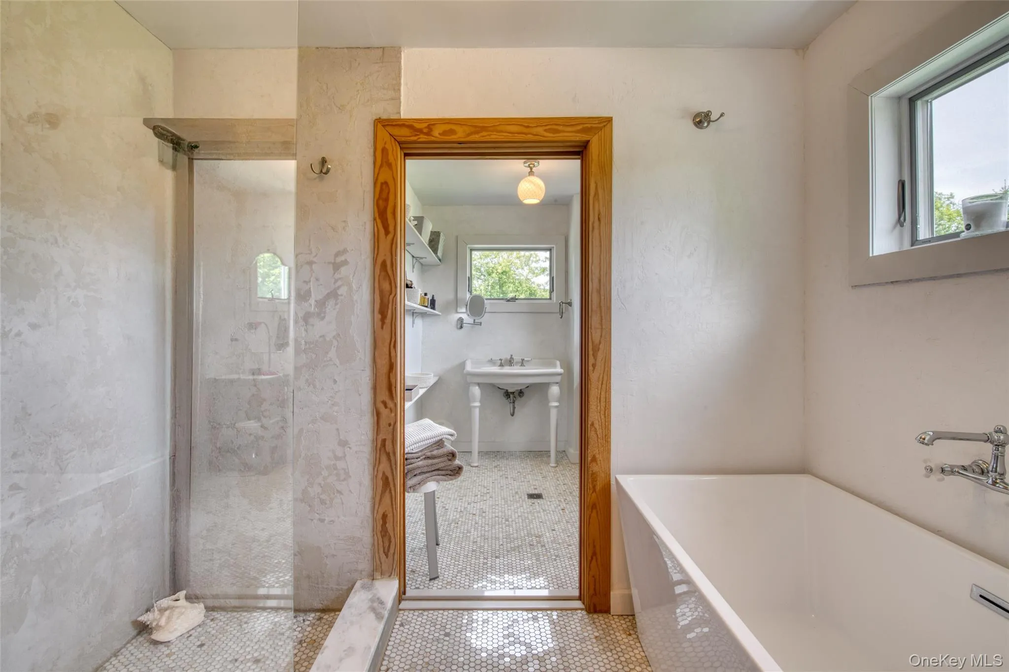 Main House: master bath with tub & separate shower Main House: master bath with tub & separate shower