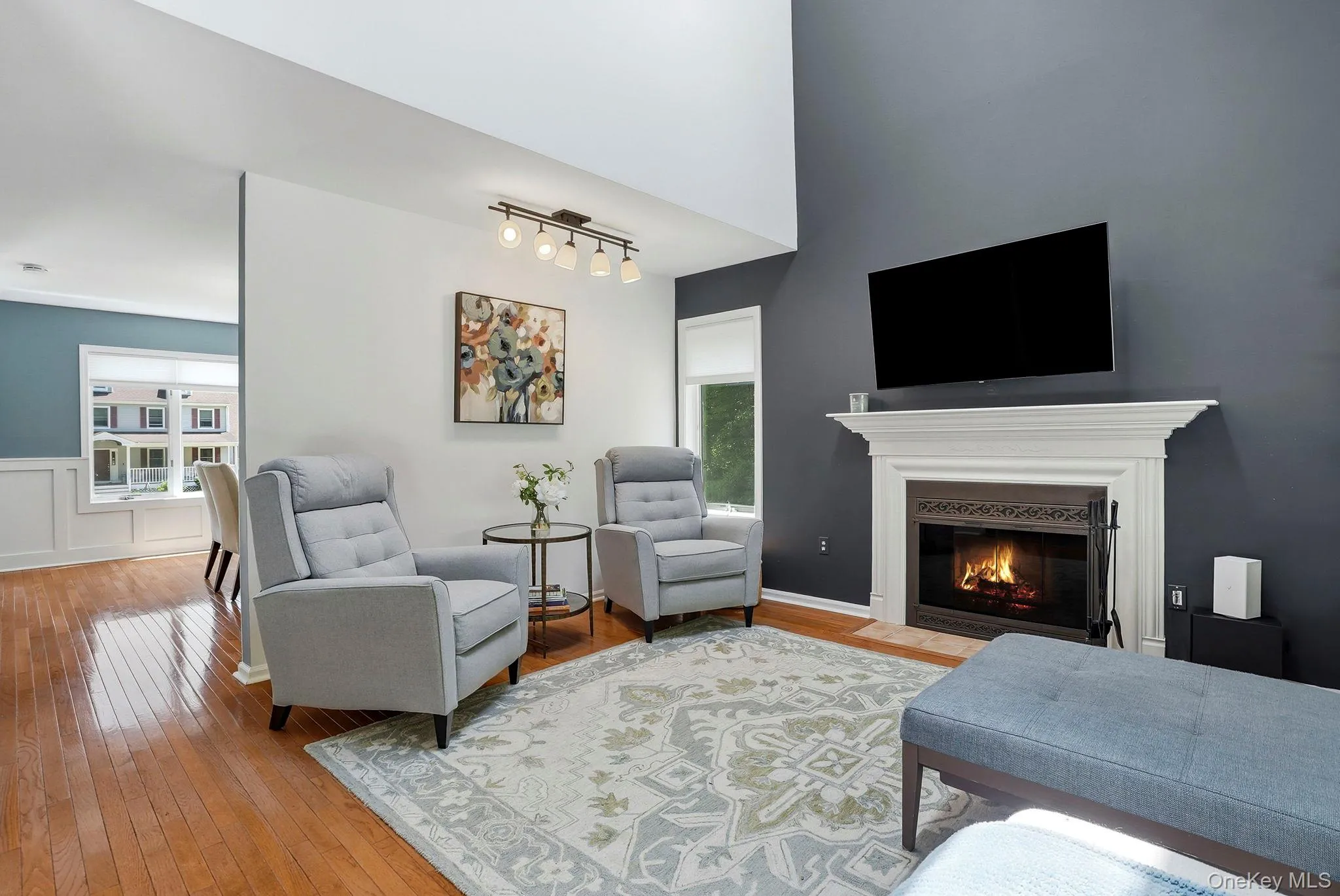 Vaulted ceilings, plenty of light, and a wood burning fireplace round out the family room. Vaulted ceilings, plenty of light, and a wood burning fireplace round out the family room.