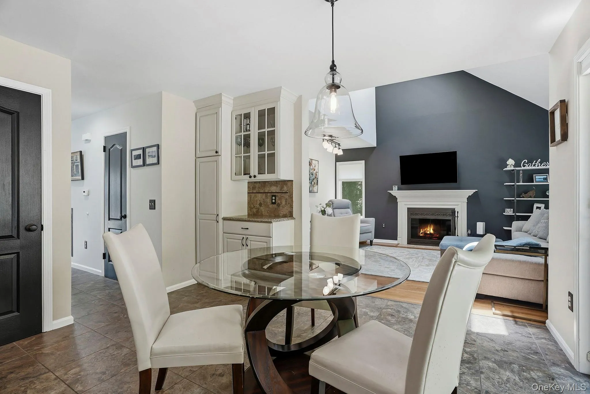 The generously sized eat-in kitchen opens to the family room. The generously sized eat-in kitchen opens to the family room.