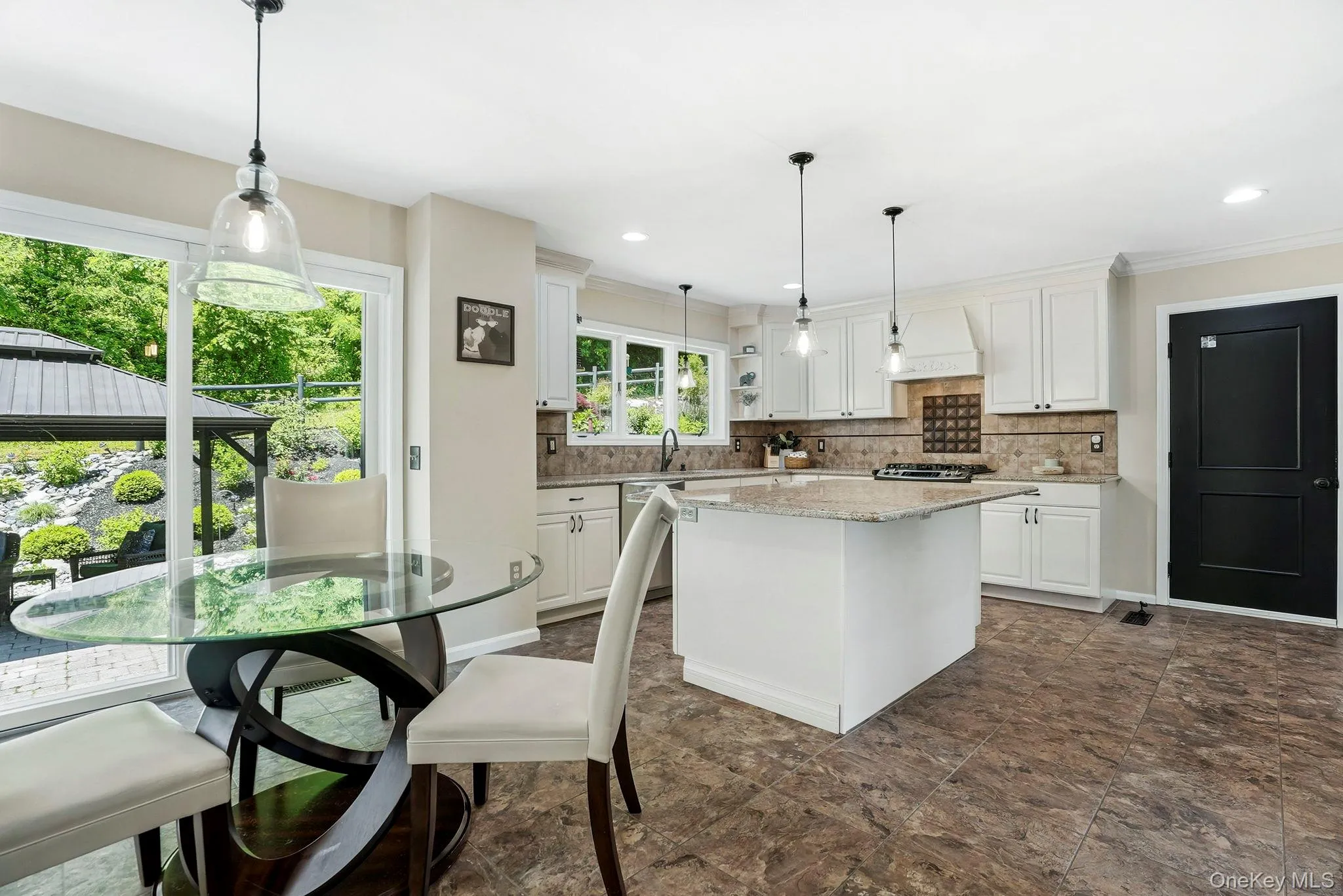 This chef's kitchen includes space for seating at the island too. This chef's kitchen includes space for seating at the island too.