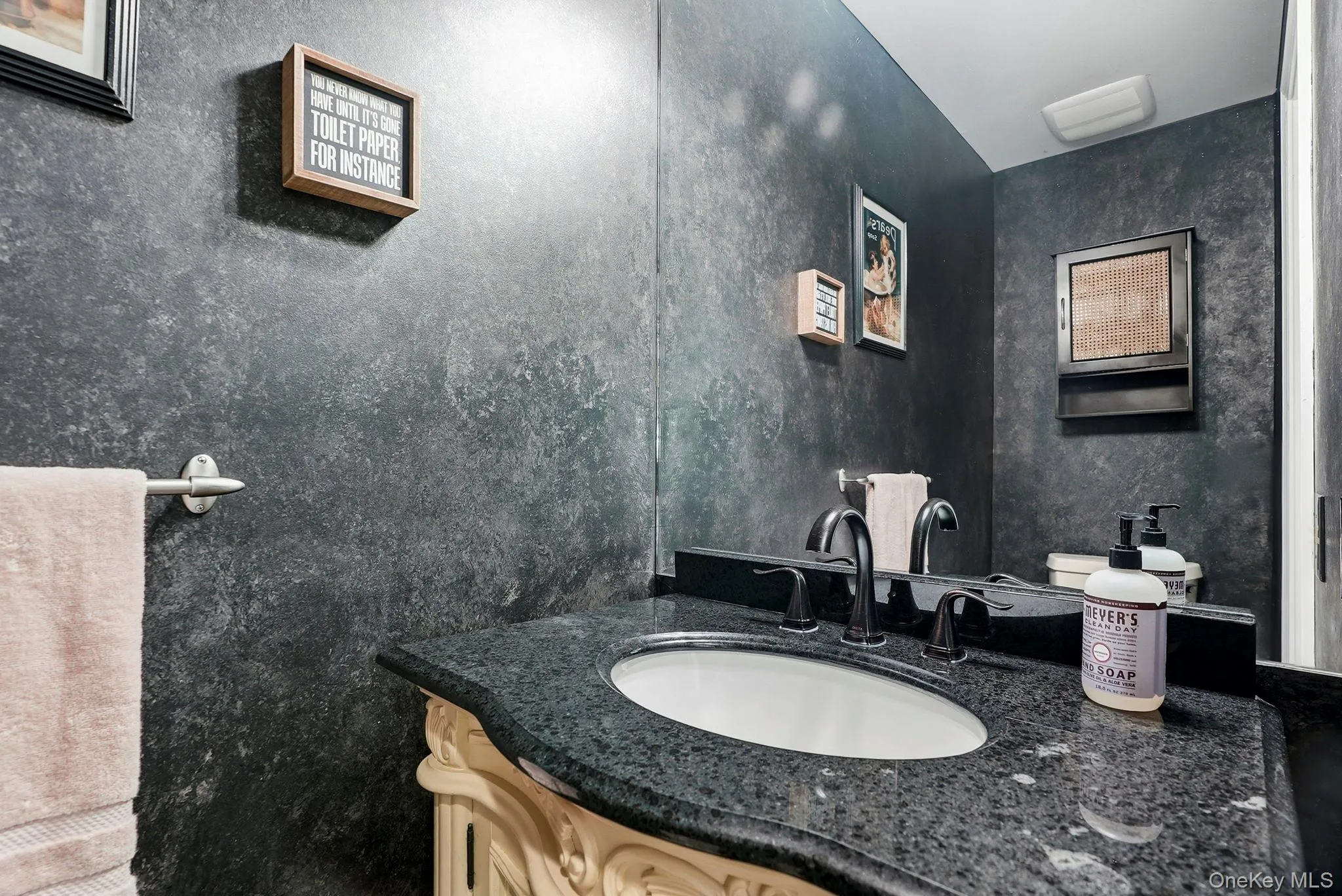 Here's the main level guest powder room. Here's the main level guest powder room.