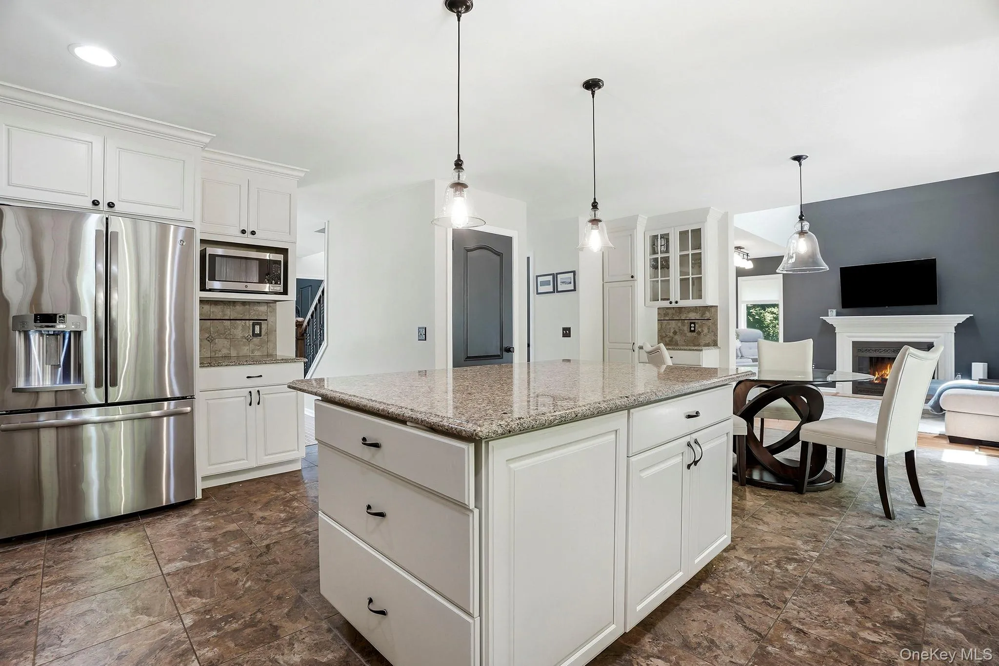 Open to all - the kitchen as hub of the home easily connects to the family room, current office and dining room. Open to all - the kitchen as hub of the home easily connects to the family room, current office and dining room.