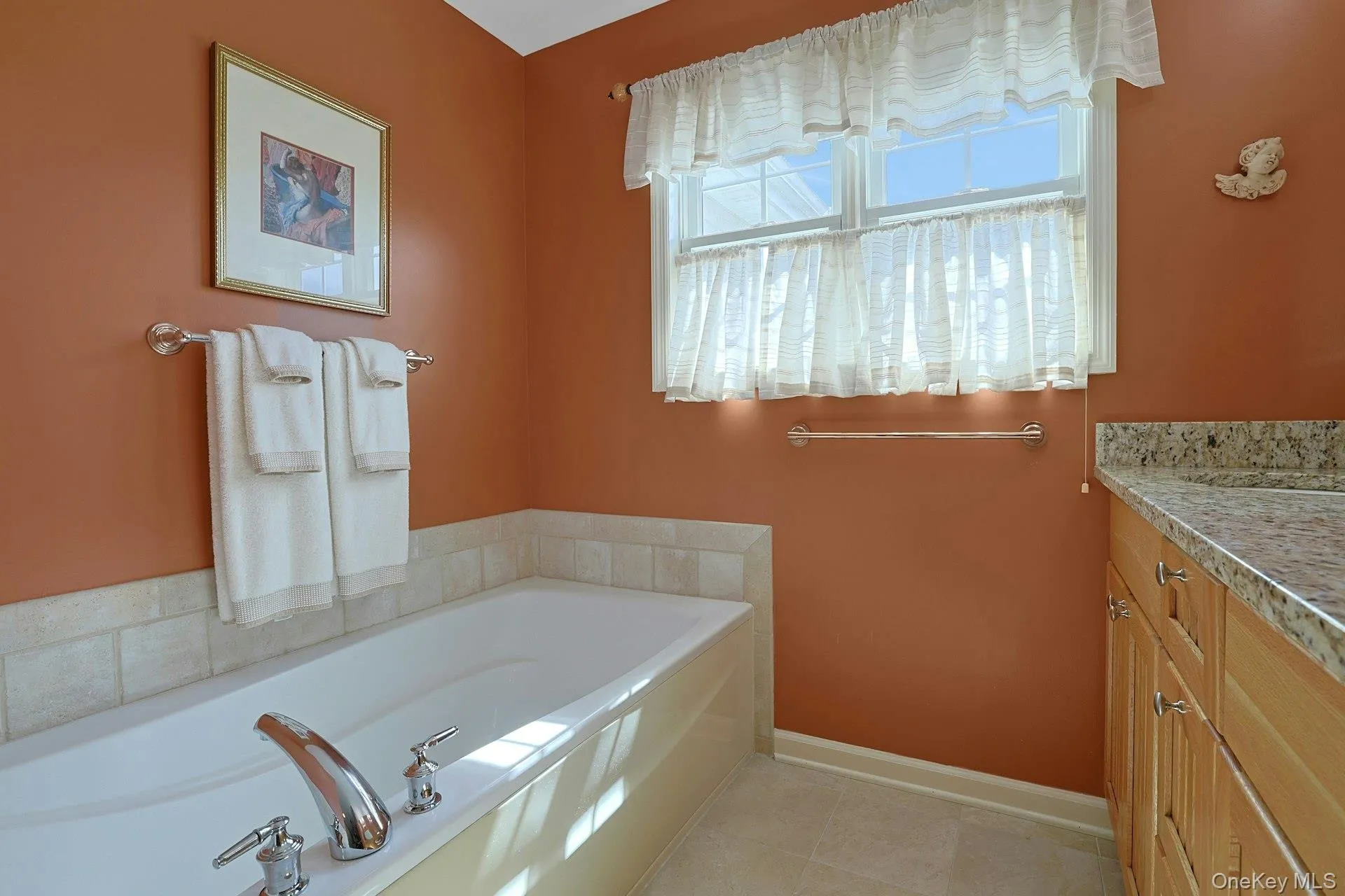 The primary bedroom includes an en suite bathroom, offering added privacy. The primary bedroom includes an en suite bathroom, offering added privacy.