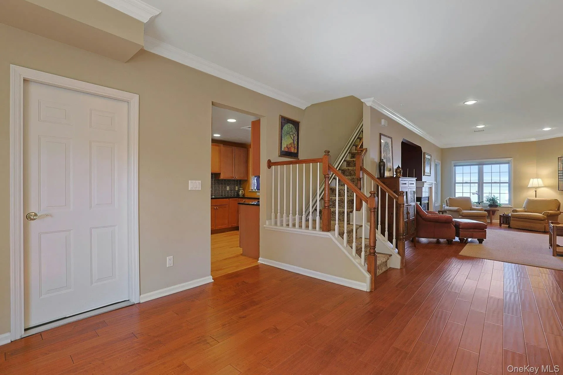 The open plan living area creates easy flow into the kitchen and living room, with convenient access to the staircase leading to the second floor. The open plan living area creates easy flow into the kitchen and living room, with convenient access to the staircase leading to the second floor.