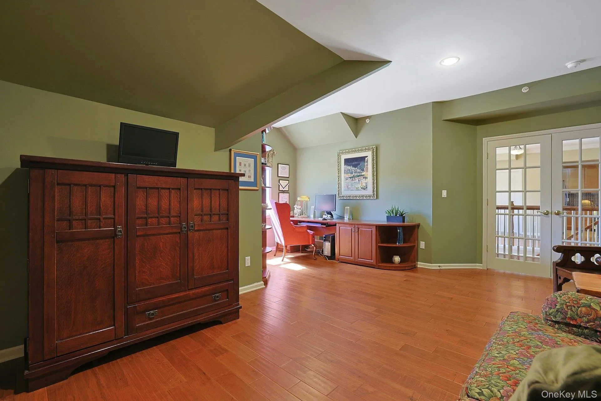 French doors allow this sitting room to feel separate and private, making it ideal for a home office, reading room, or guest space. French doors allow this sitting room to feel separate and private, making it ideal for a home office, reading room, or guest space.