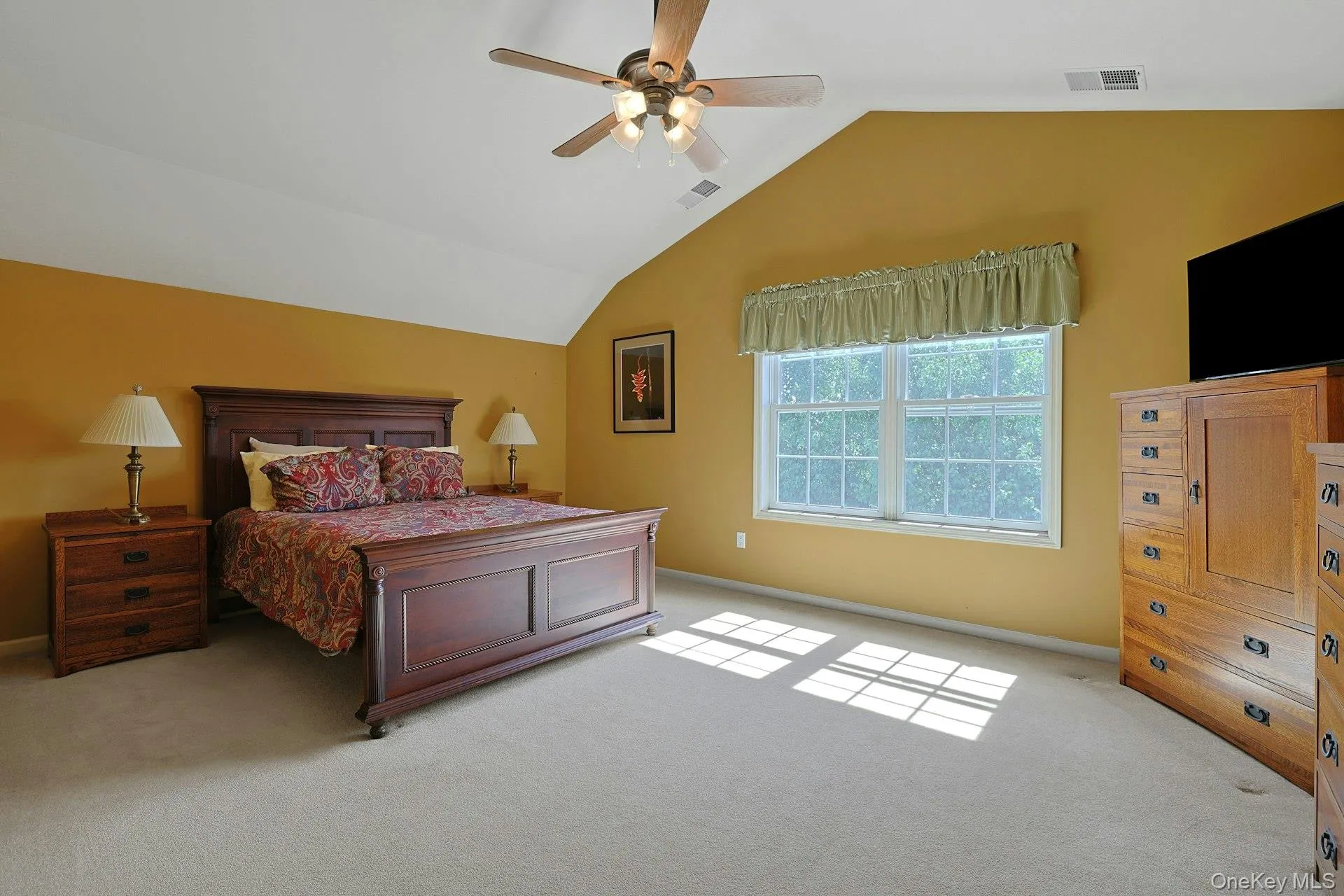 The large primary bedroom has beautiful natural light and plenty of space to relax. The large primary bedroom has beautiful natural light and plenty of space to relax.