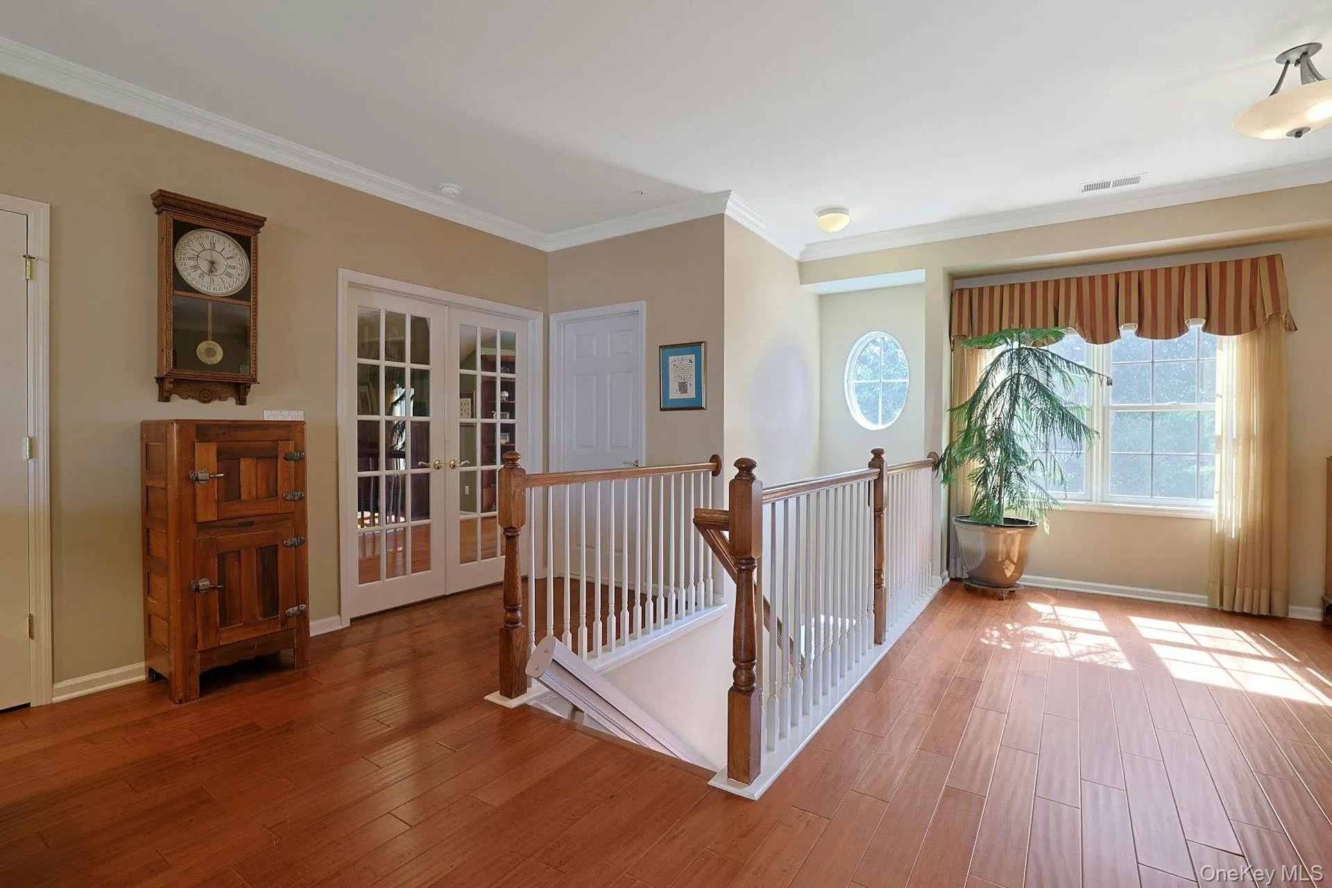 .A bright upper landing adds openness and a comfortable transition between levels. .A bright upper landing adds openness and a comfortable transition between levels.