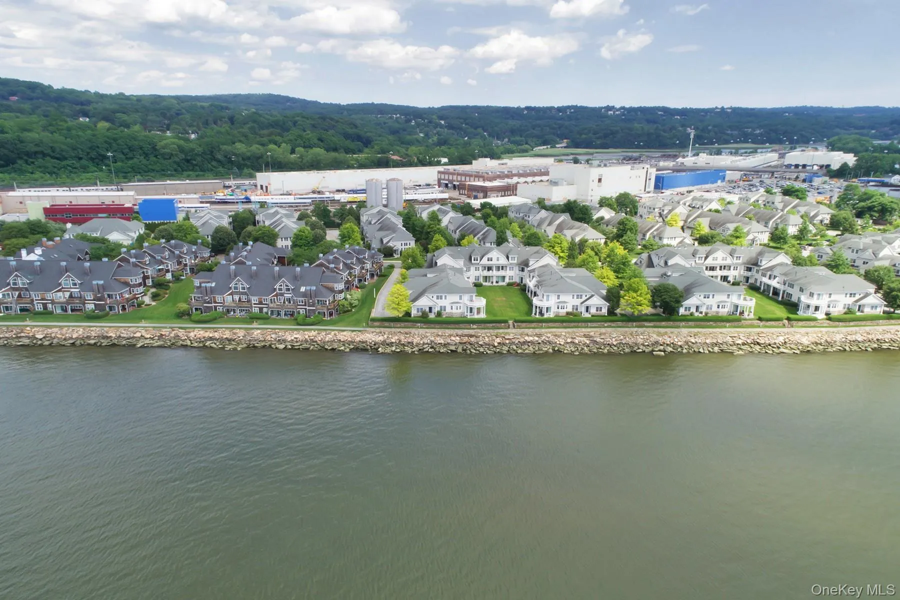 An aerial view of Half Moon Bay showcases the beauty of this exceptional waterfront community along the Hudson River. An aerial view of Half Moon Bay showcases the beauty of this exceptional waterfront community along the Hudson River.