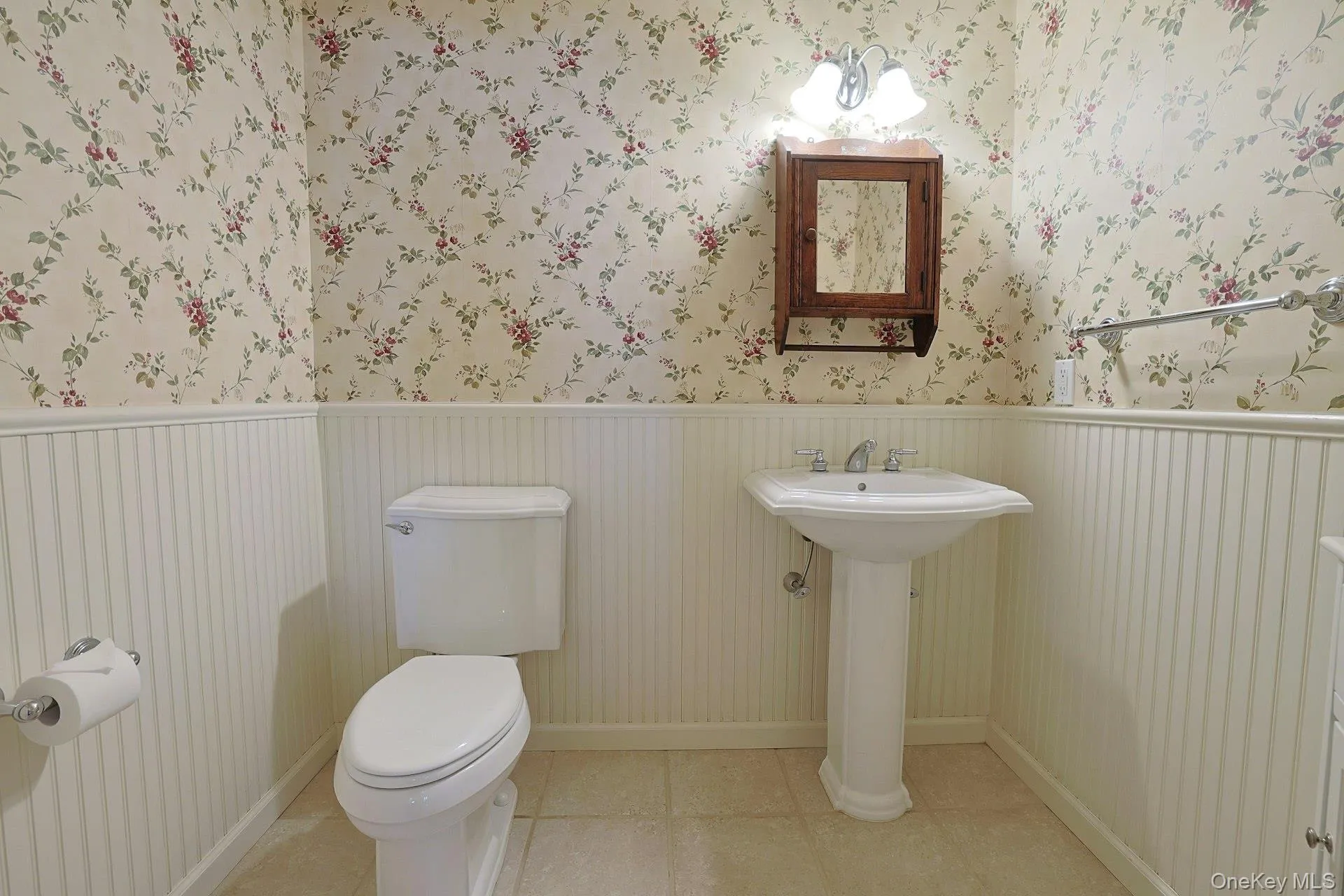 A convenient half bath on the main floor adds ease for guests and everyday living. A convenient half bath on the main floor adds ease for guests and everyday living.