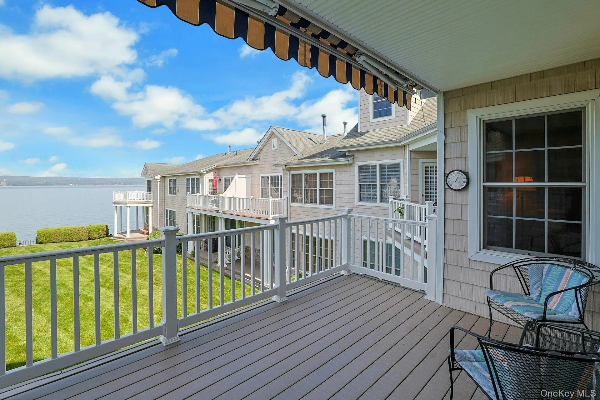The large terrace creates a wonderful outdoor extension of the home, perfect for dining, lounging, and taking in the views. The large terrace creates a wonderful outdoor extension of the home, perfect for dining, lounging, and taking in the views.