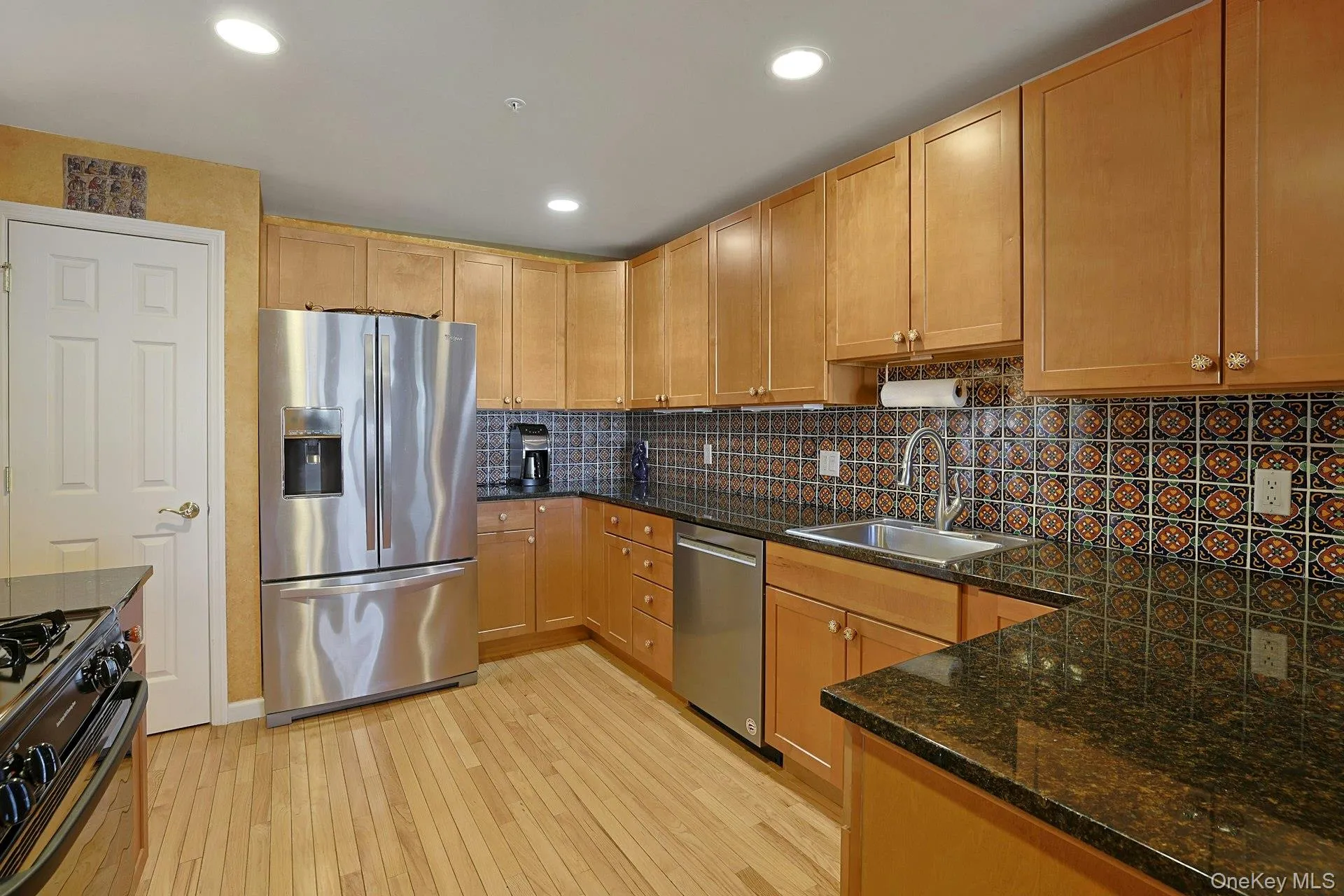 The large kitchen has stainless steel appliances and a pantry closet, with lots of cabinetry and plenty of room for meal prep and everyday living. The large kitchen has stainless steel appliances and a pantry closet, with lots of cabinetry and plenty of room for meal prep and everyday living.