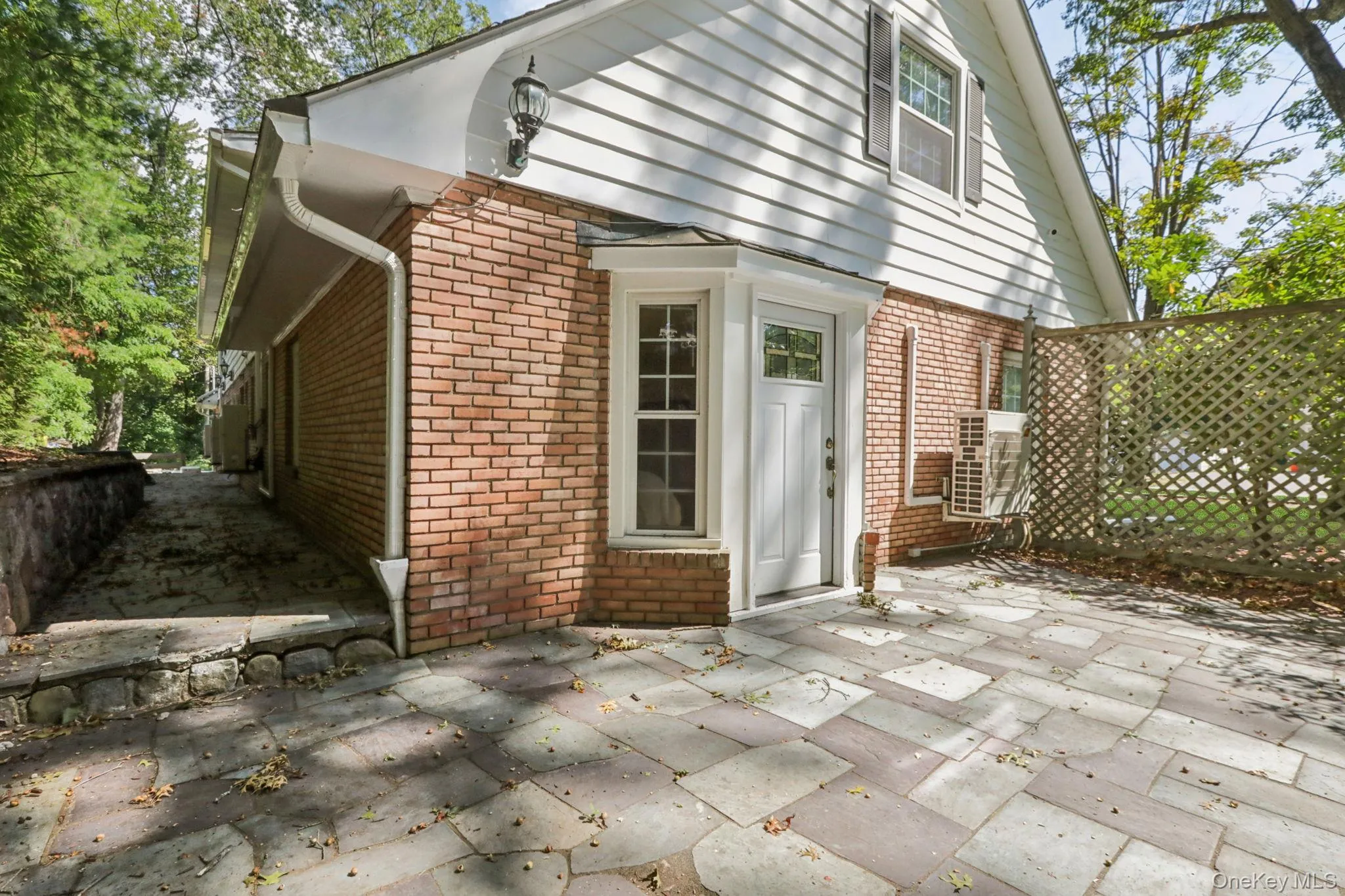 Private stone patio leading to Primary bedroom Private stone patio leading to Primary bedroom