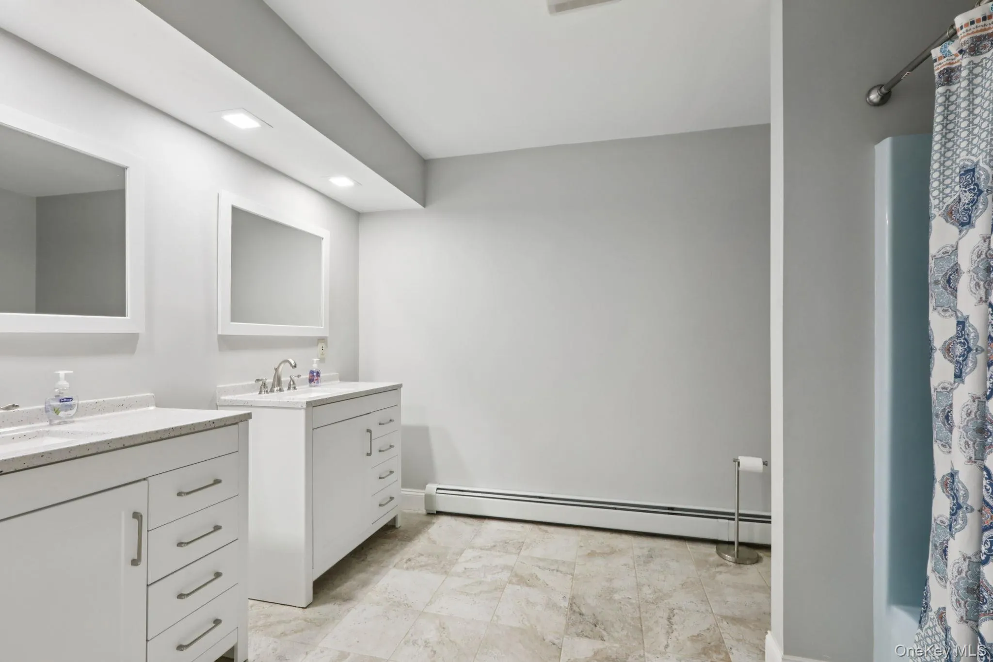 Full bathroom on 2nd floor with separate single-sink vanities, tub, shower Full bathroom on 2nd floor with separate single-sink vanities, tub, shower