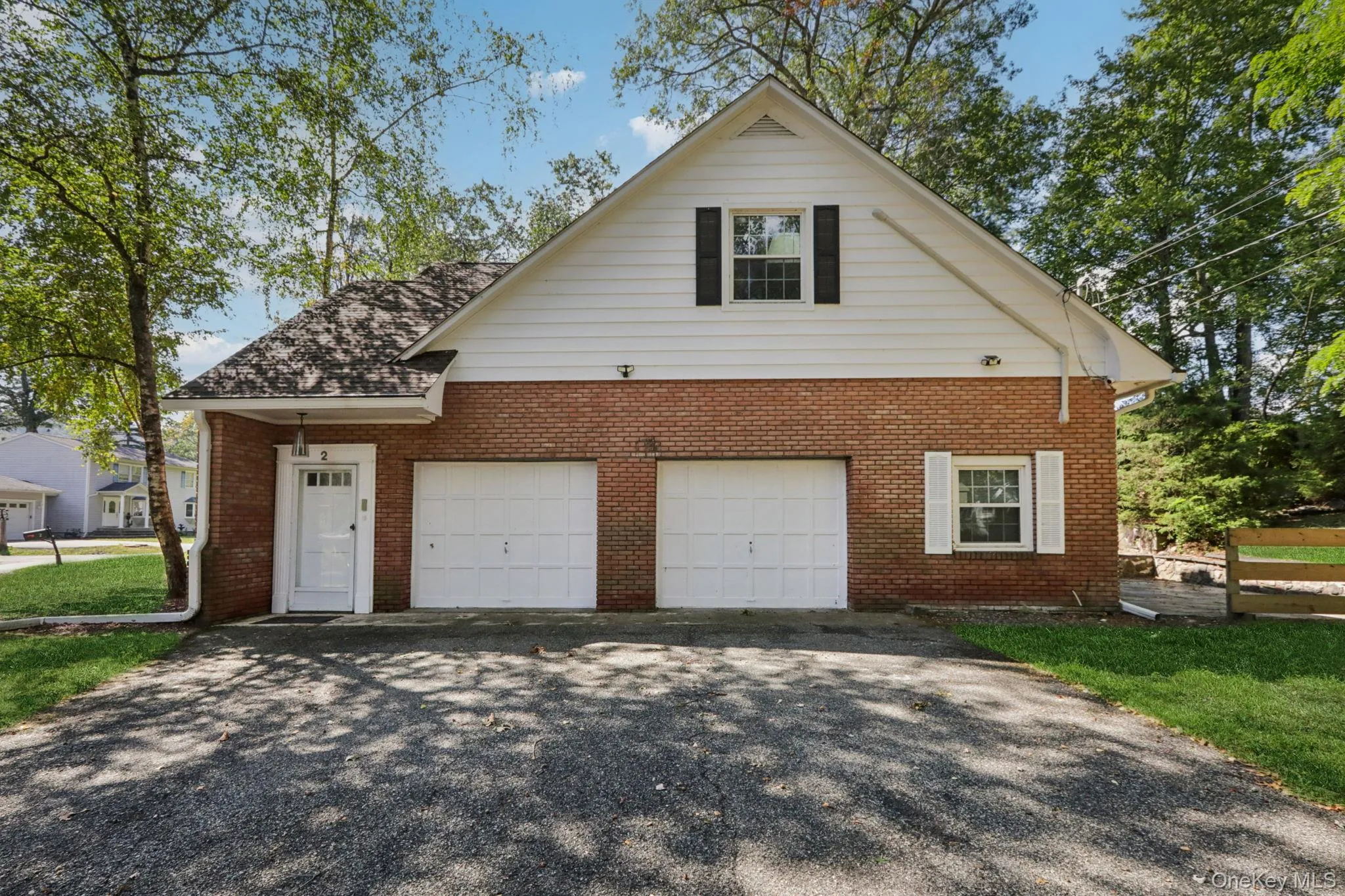 2-car garage and driveway with ample parking 2-car garage and driveway with ample parking