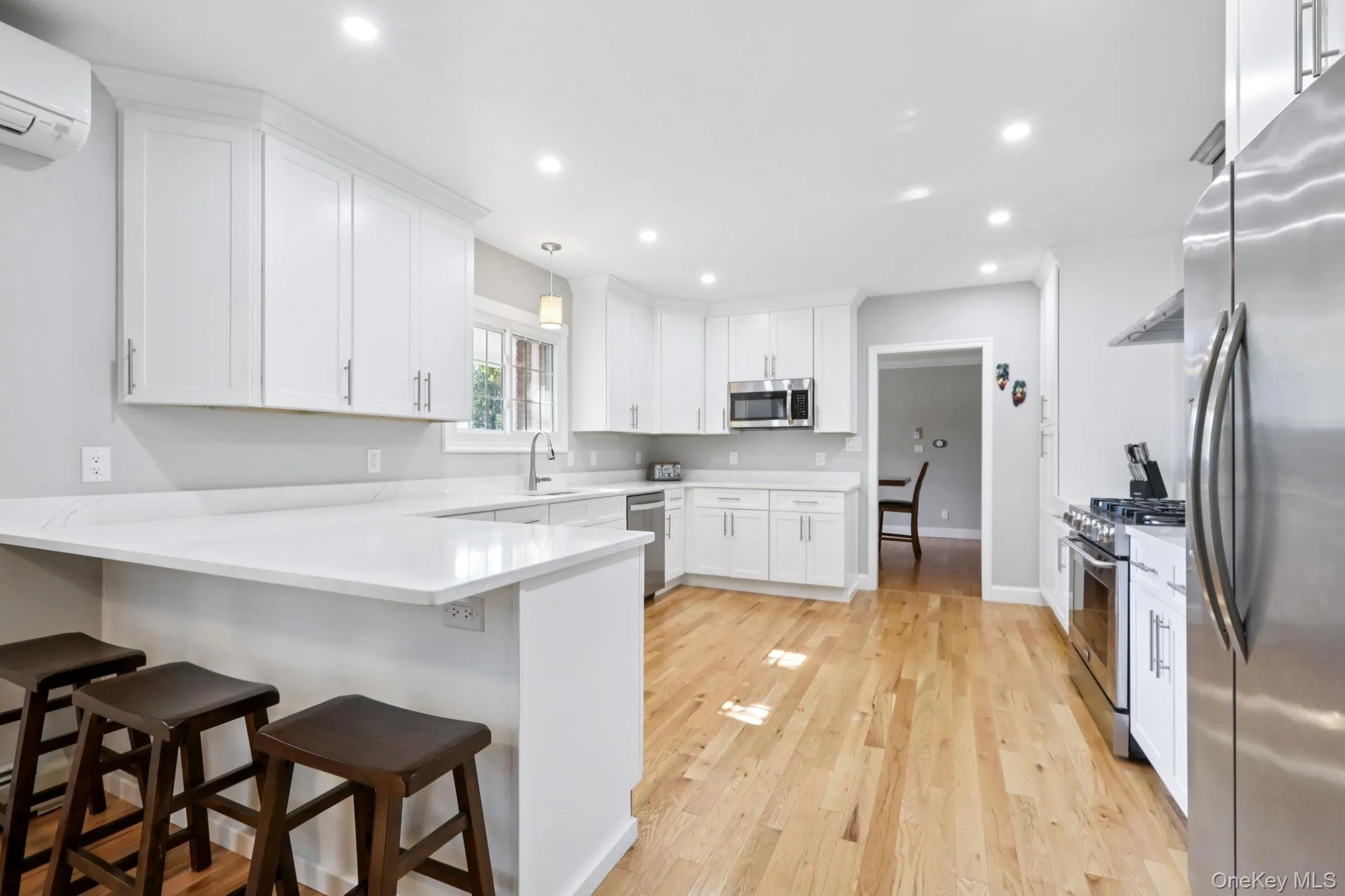 A peninsula with counter stools adds a more casual eating area ~ perfect for casual conversation A peninsula with counter stools adds a more casual eating area ~ perfect for casual conversation