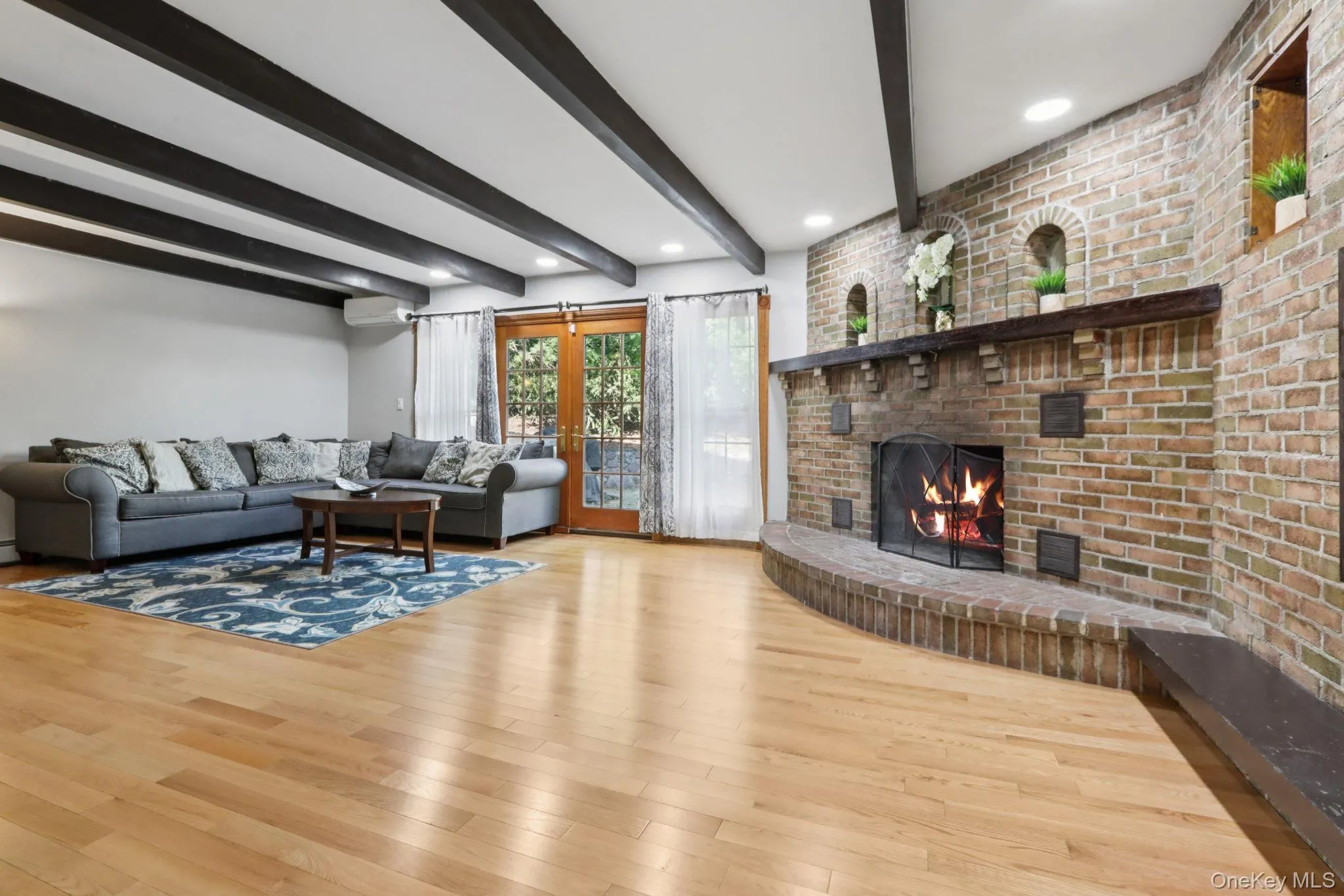 Spacious family room for all your entertaining needs ~ movie nights, large gatherings, or spending quality time. Spacious family room for all your entertaining needs ~ movie nights, large gatherings, or spending quality time.