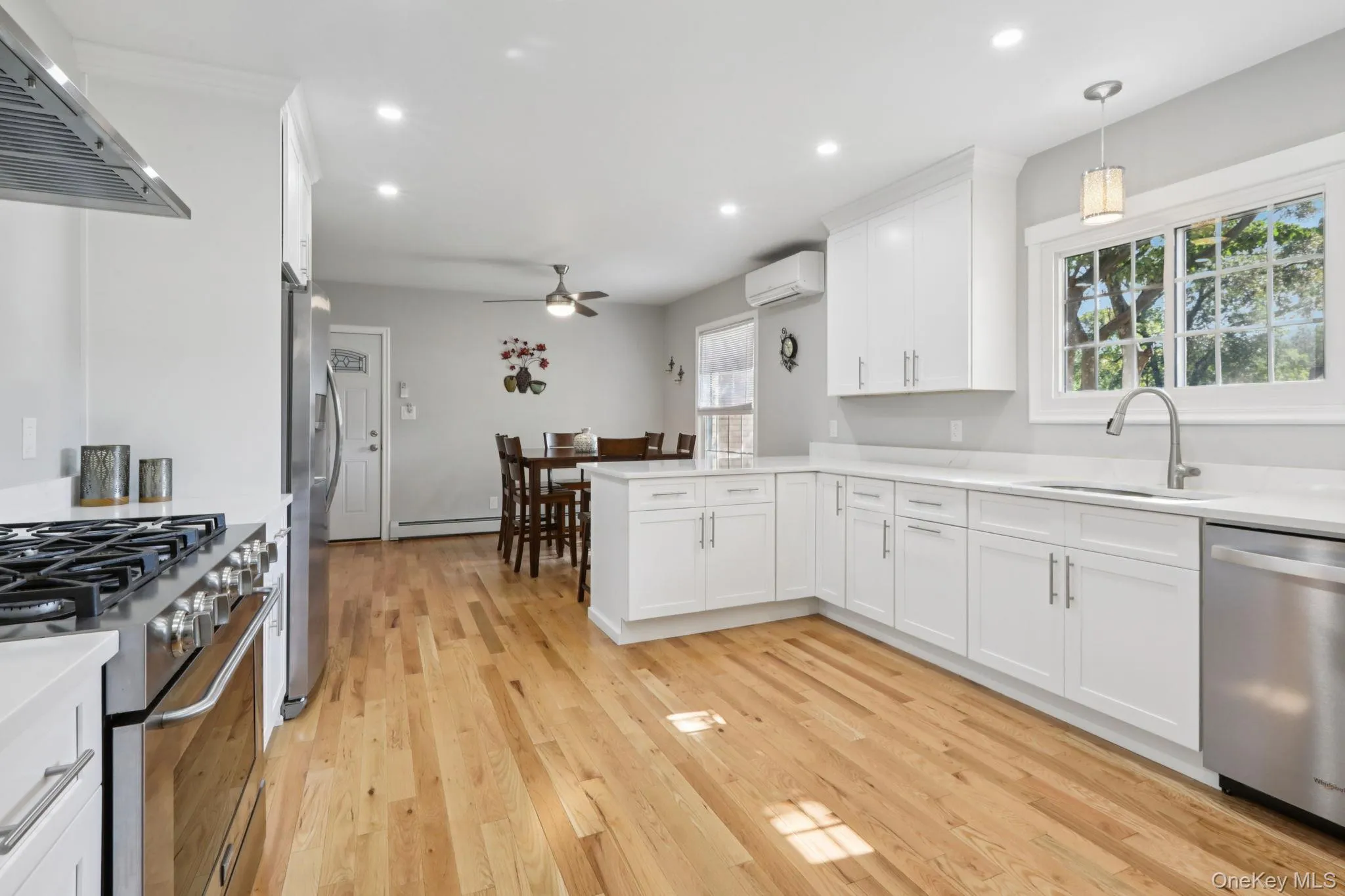 Stainless steel appliances, including a 6-burner gas range Stainless steel appliances, including a 6-burner gas range