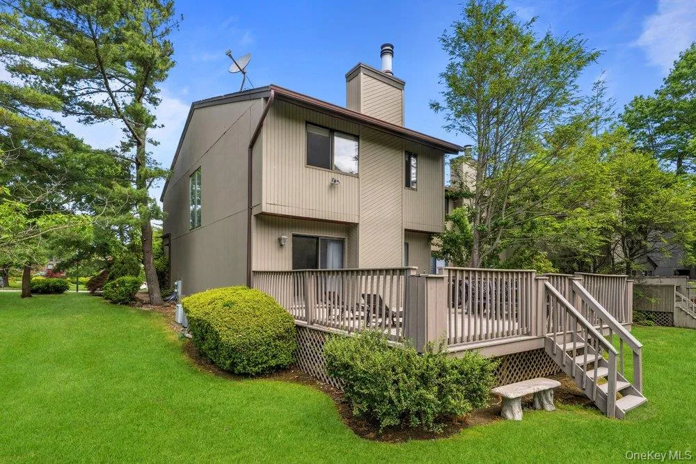 Multi-level wood deck with matching railings and stairs Multi-level wood deck with matching railings and stairs