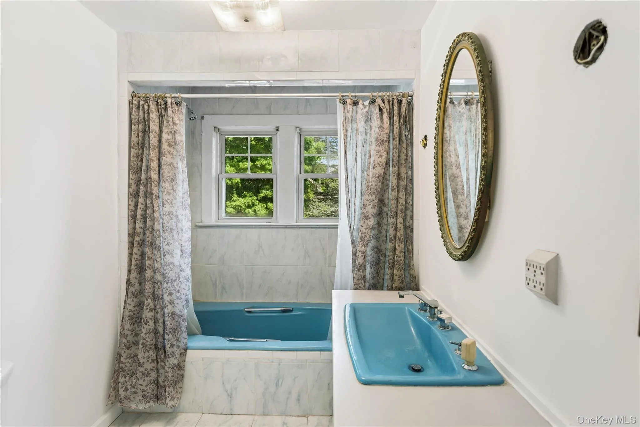 Second floor full bathroom with combo tub and shower Second floor full bathroom with combo tub and shower